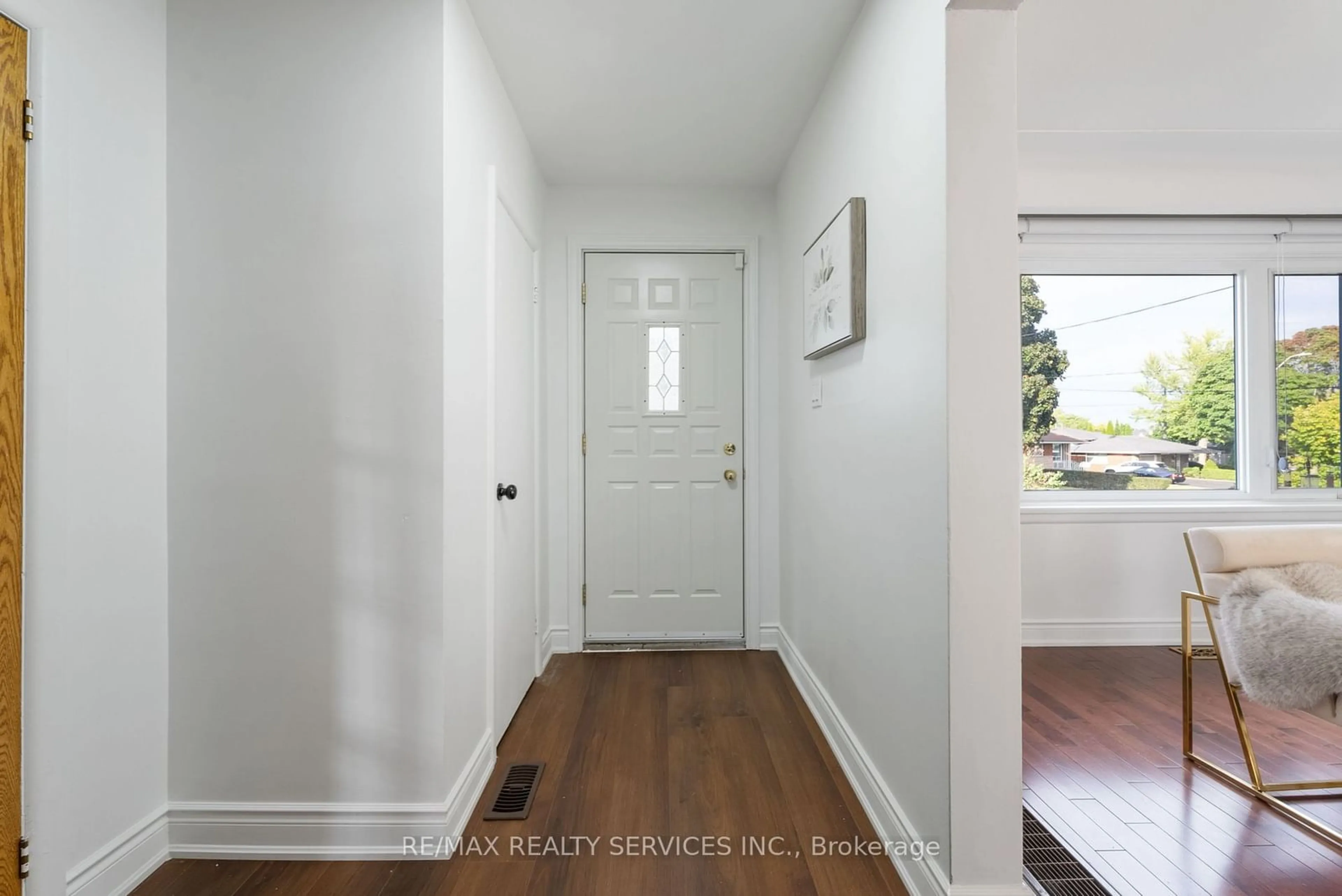 Indoor entryway, wood floors for 54 Orphir Rd, Hamilton Ontario L8K 3Z2