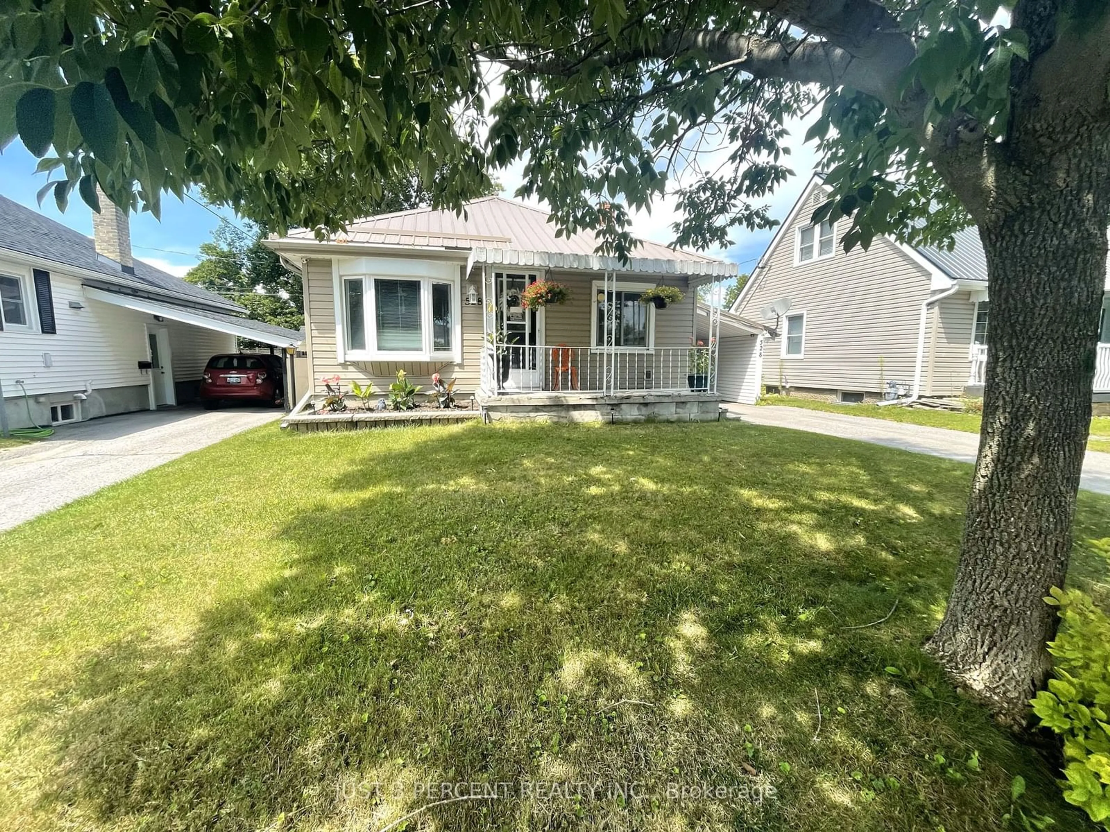 Frontside or backside of a home, the fenced backyard for 528 Howden St, Peterborough Ontario K9J 4B5