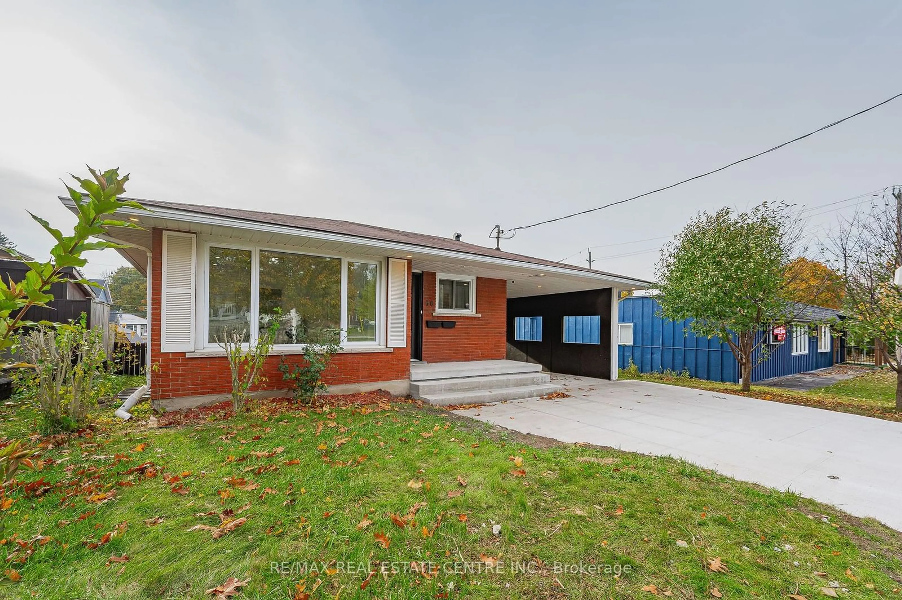 Frontside or backside of a home, the fenced backyard for 66 Beech Ave, Cambridge Ontario N3C 1X5