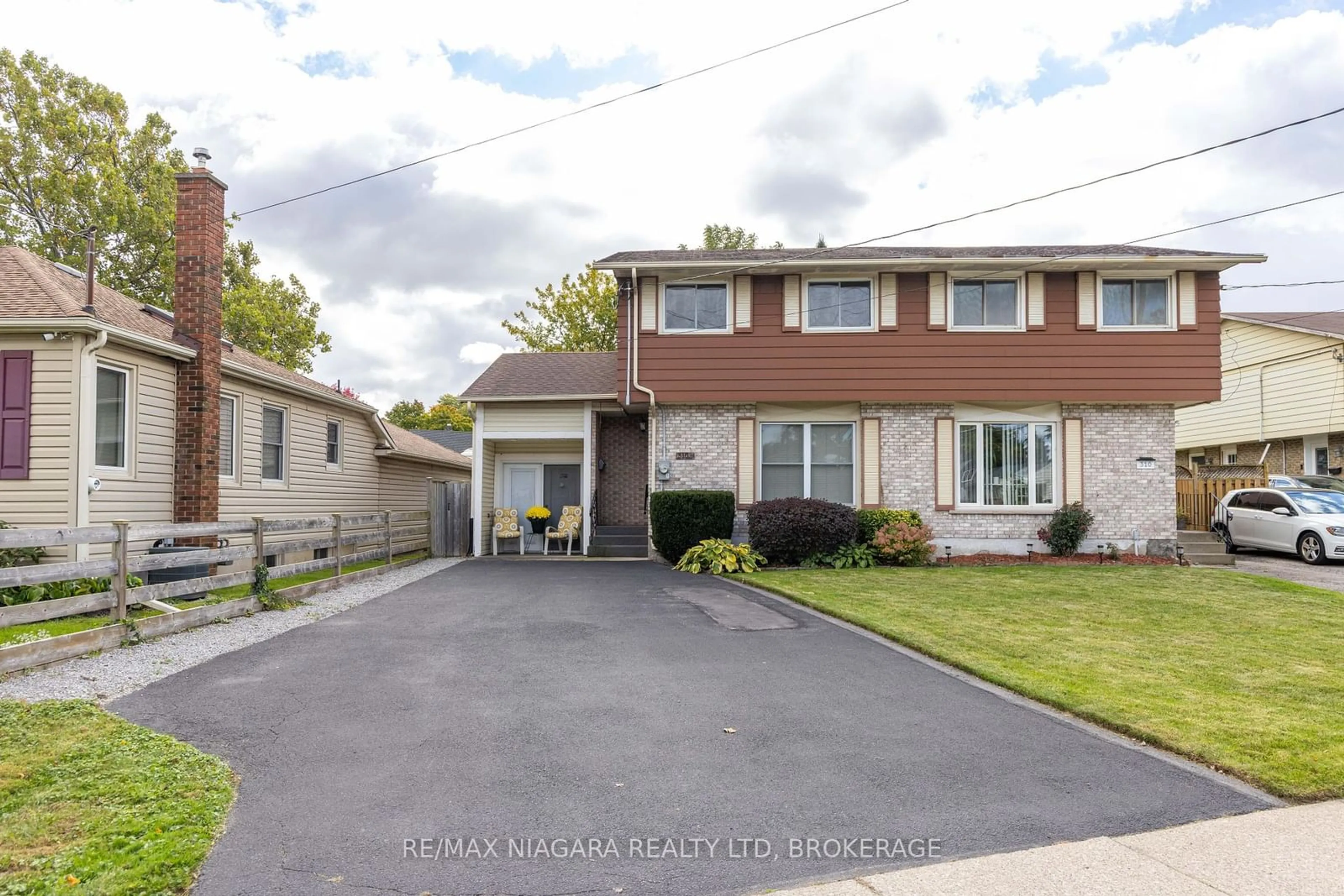 Frontside or backside of a home, the street view for 310 1/2 Linwell Rd, St. Catharines Ontario L2N 1T3