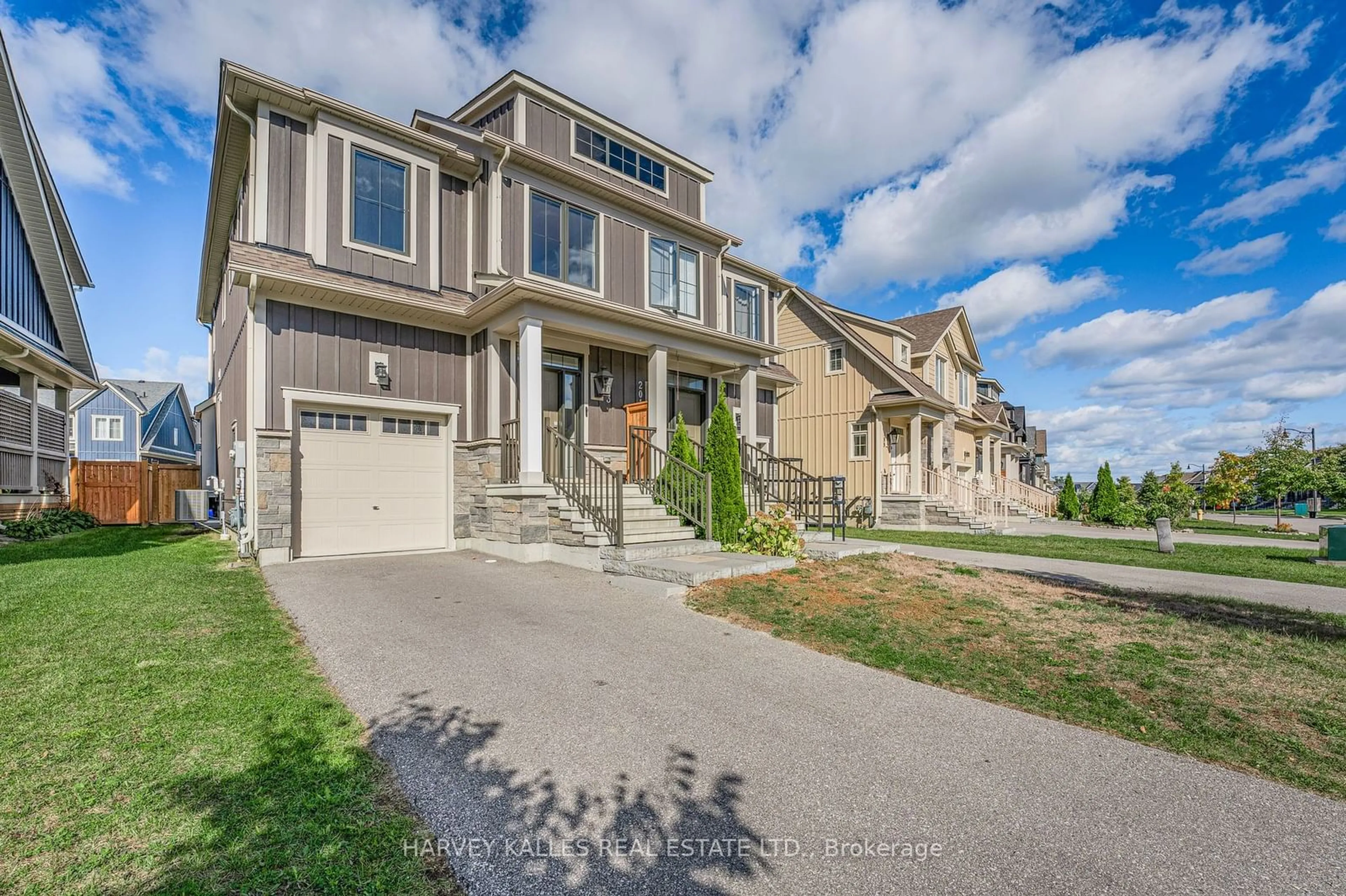 A pic from exterior of the house or condo, the street view for 203 Yellow Birch Cres, Blue Mountains Ontario L9Y 0Z3