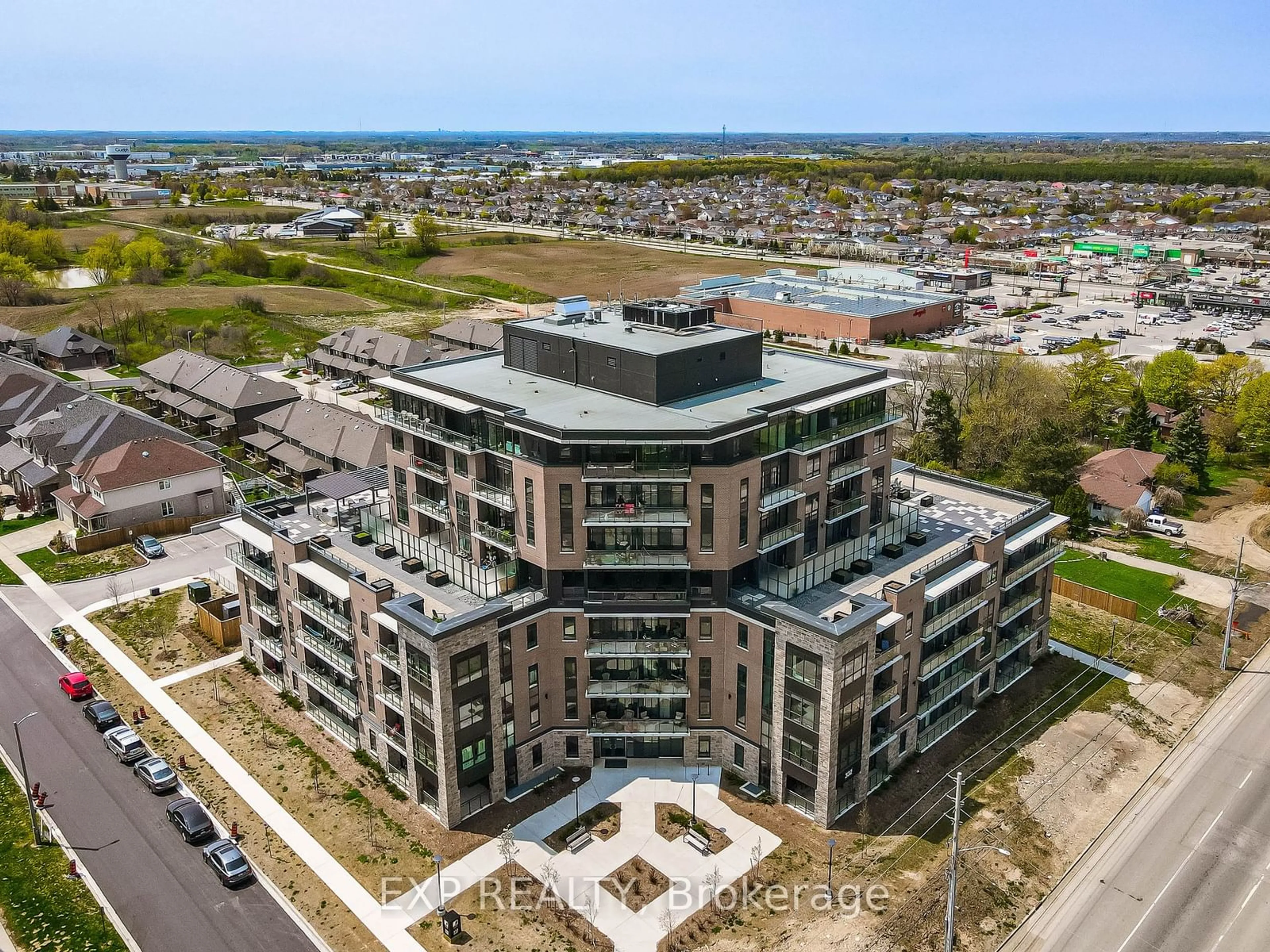 A pic from exterior of the house or condo, the front or back of building for 332 Gosling Gdns #203, Guelph Ontario N1L 0P8