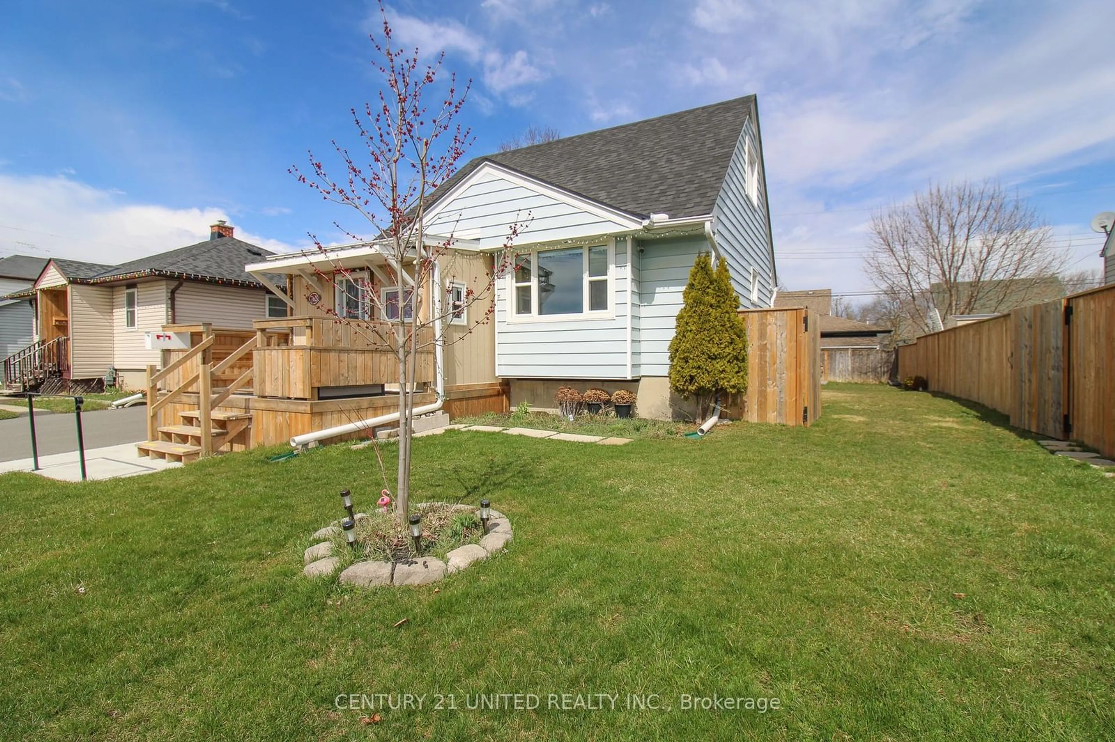 Frontside or backside of a home, the fenced backyard for 762 Gillespie Ave, Peterborough Ontario K9J 4B7