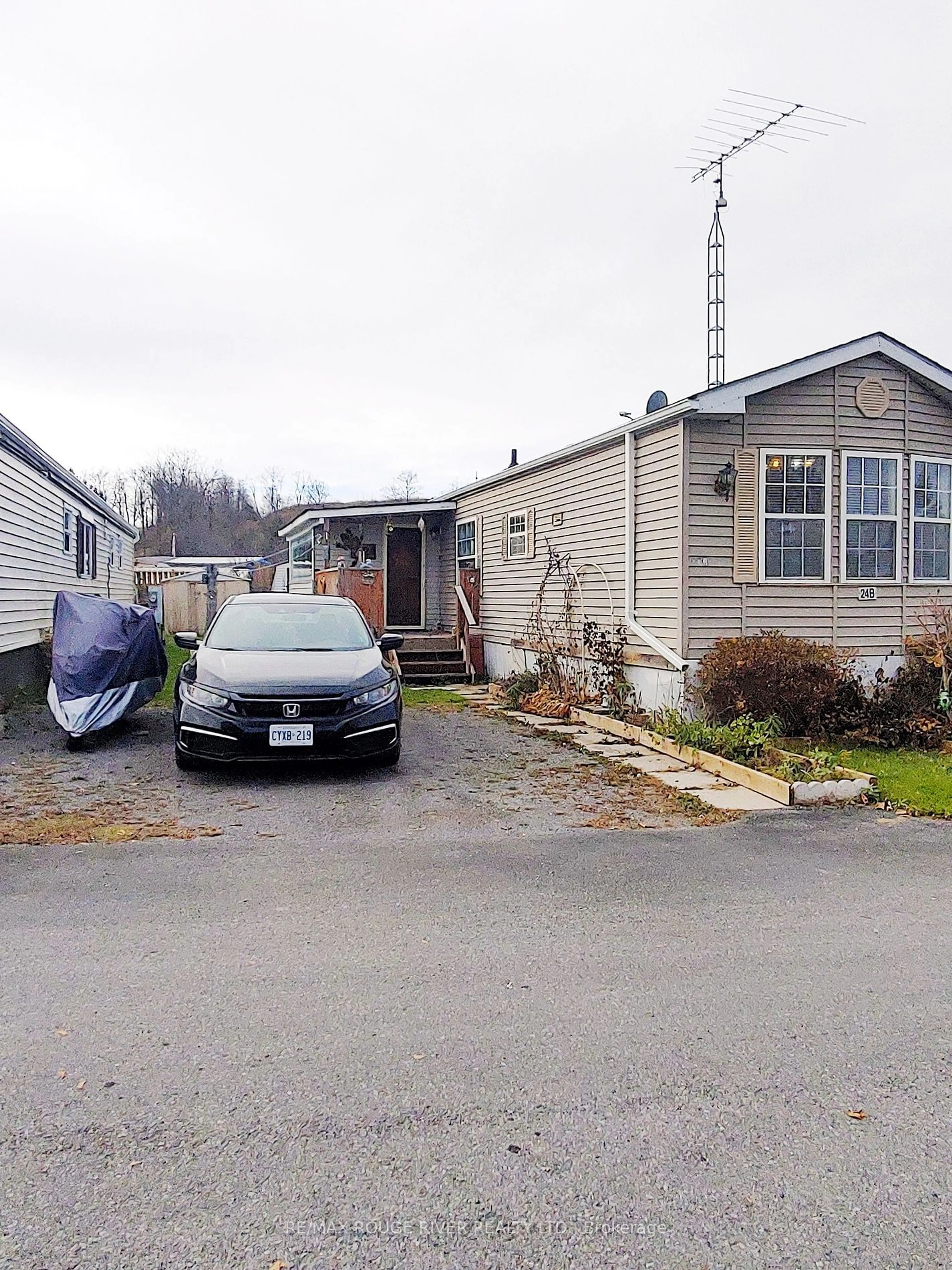 A pic from exterior of the house or condo, the street view for 2244 Heritage Line #24B, Otonabee-South Monaghan Ontario K9J 6X8