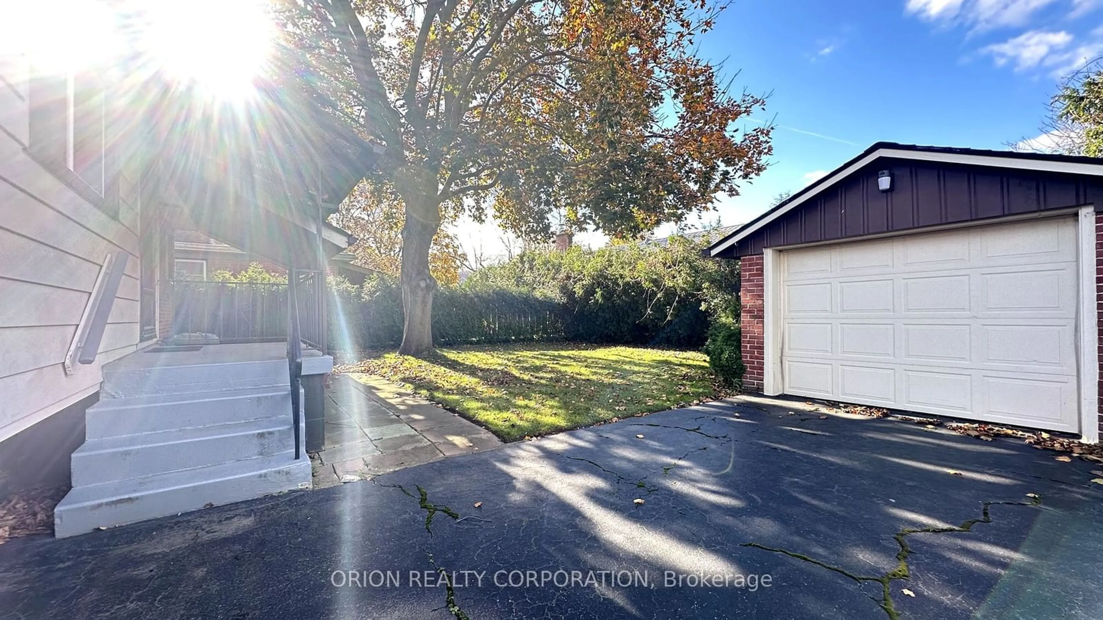 Frontside or backside of a home, the fenced backyard for 34 Lower Horning Rd, Hamilton Ontario L8S 3G1