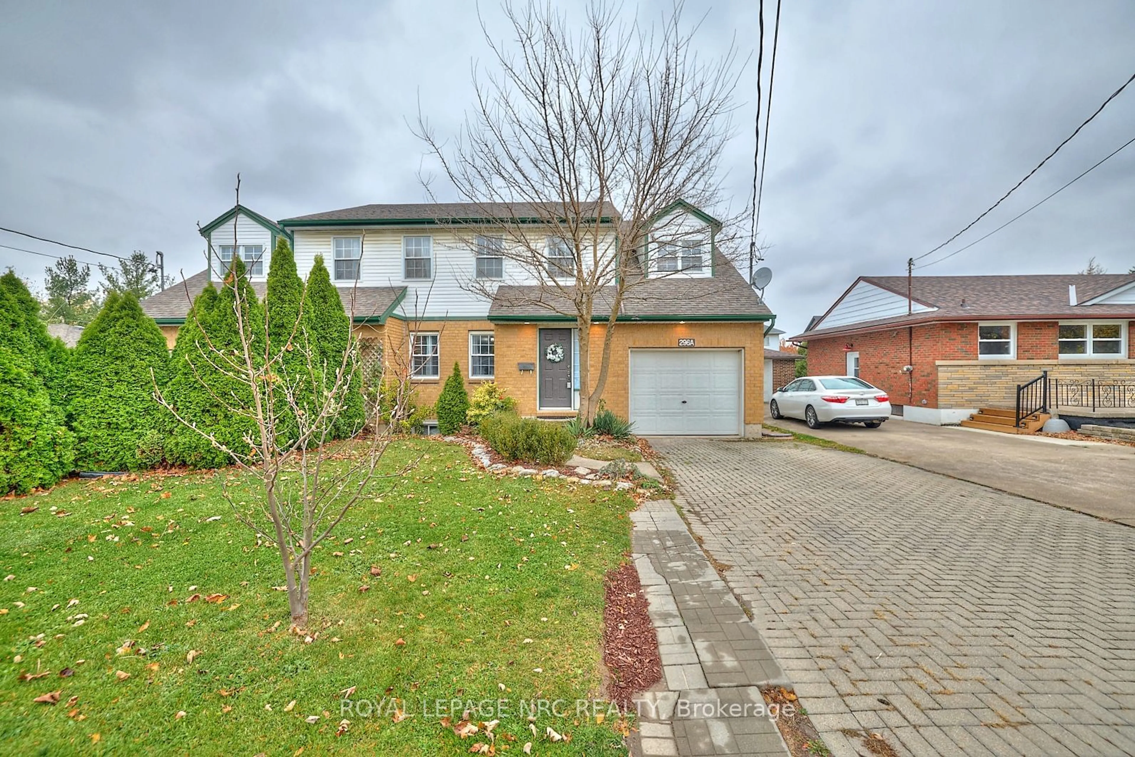 A pic from exterior of the house or condo, the street view for 296A Pelham Rd, St. Catharines Ontario L2S 1Y2