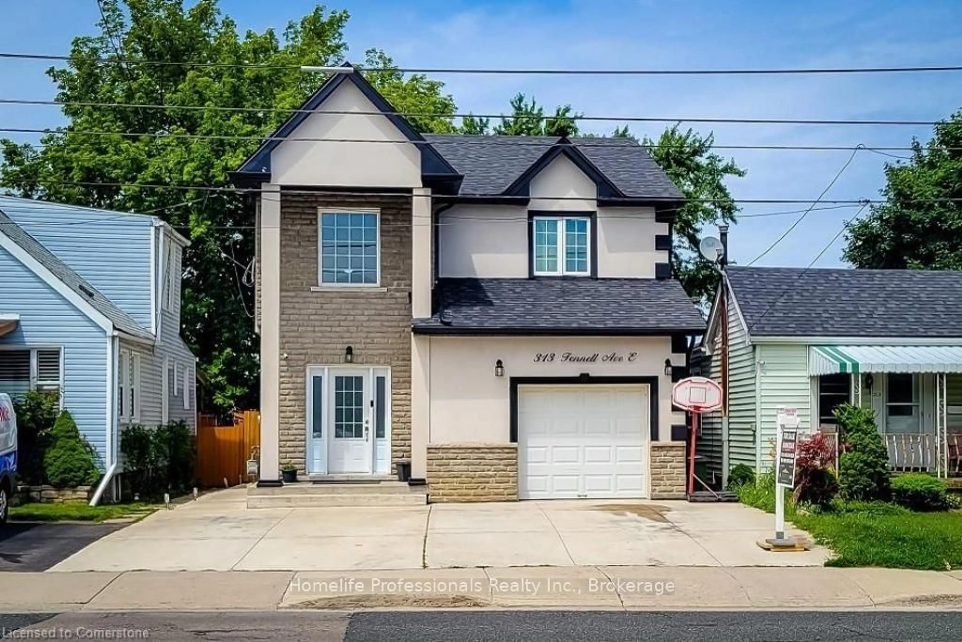 Frontside or backside of a home, cottage for 313 Fennell Ave, Hamilton Ontario L9A 1T4