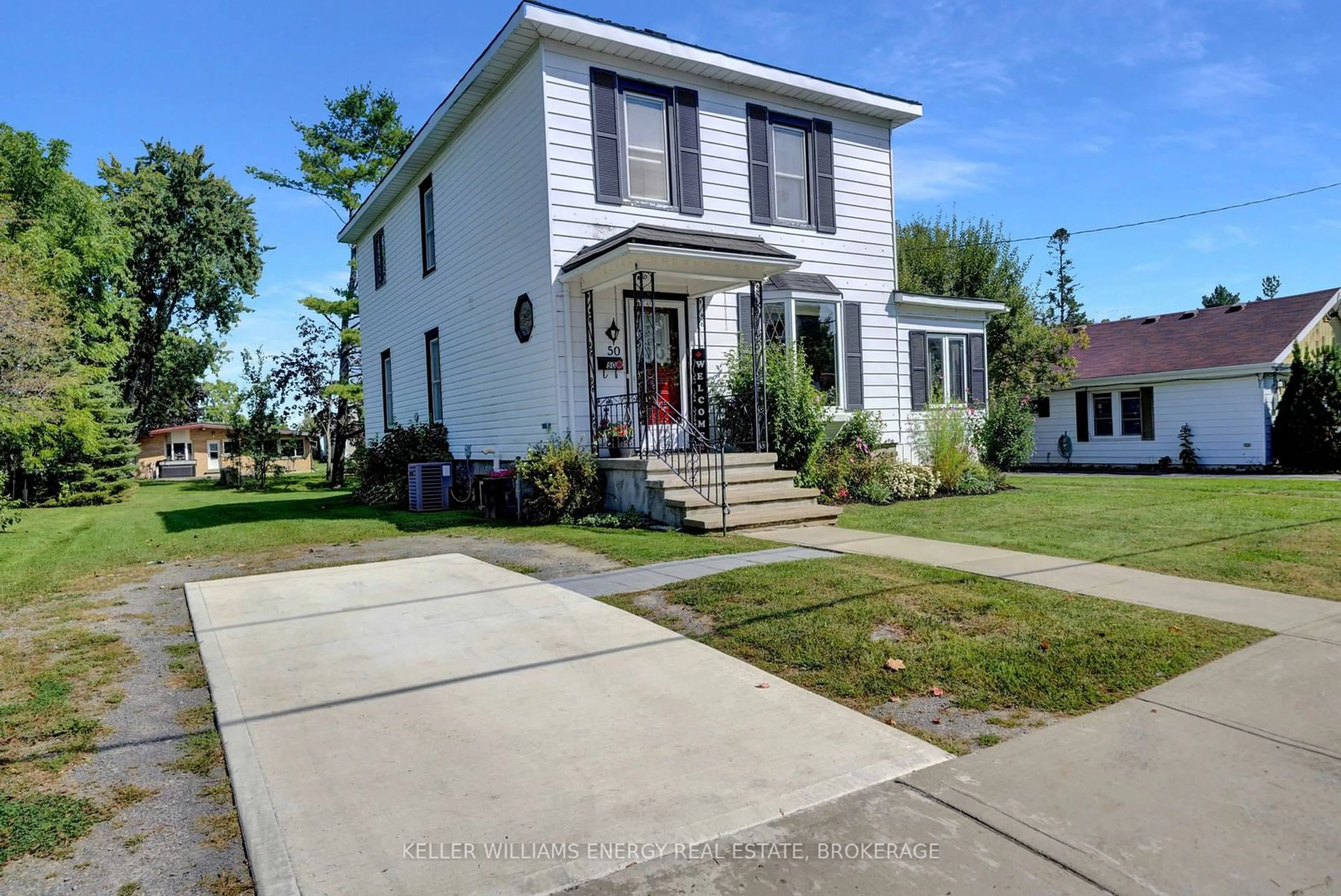 Frontside or backside of a home, the street view for 50 Centre St, Prince Edward County Ontario K0K 2T0