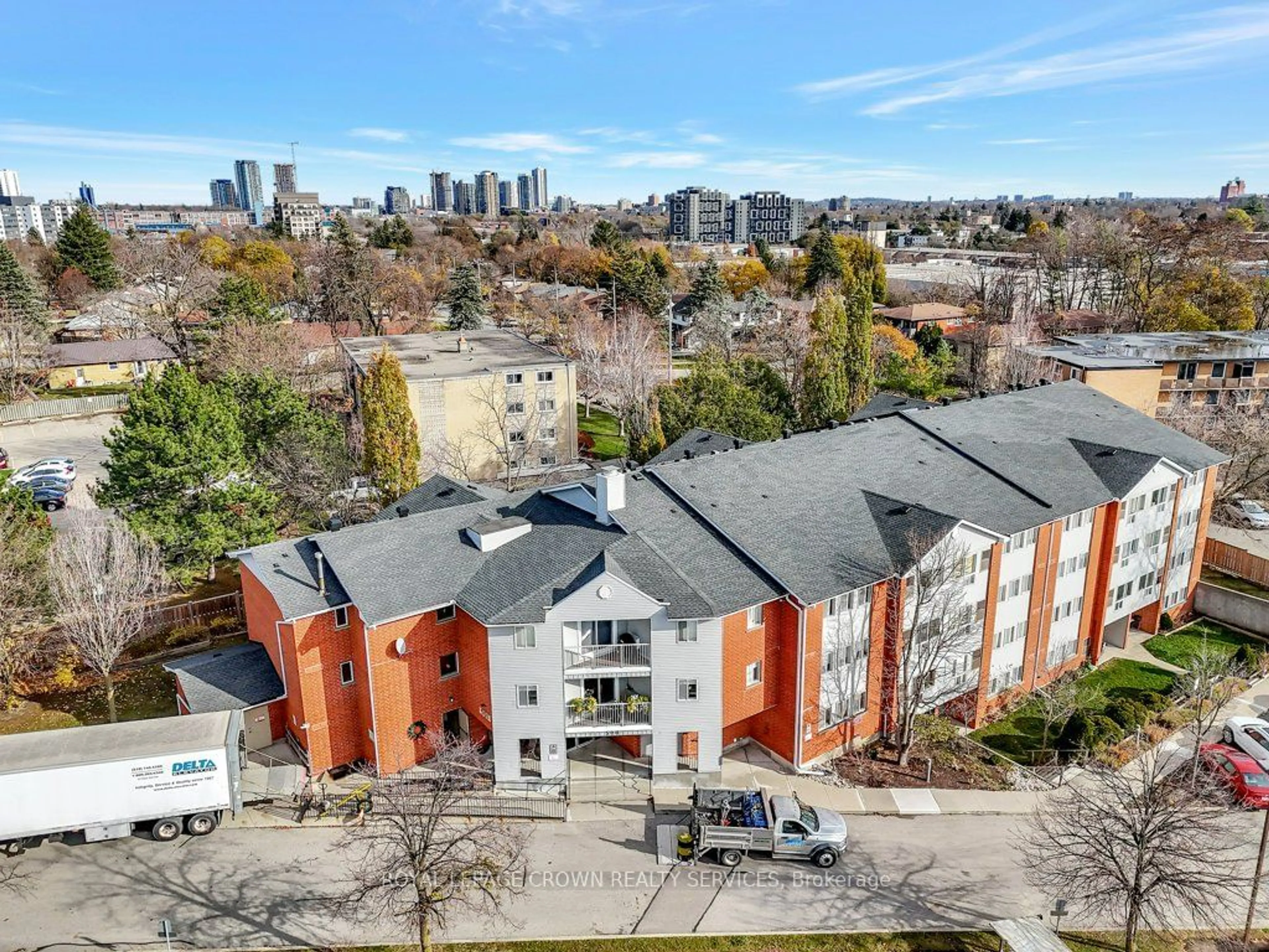 A pic from exterior of the house or condo, the view of city buildings for 500 Westmount Rd #404, Kitchener Ontario N2M 5M9