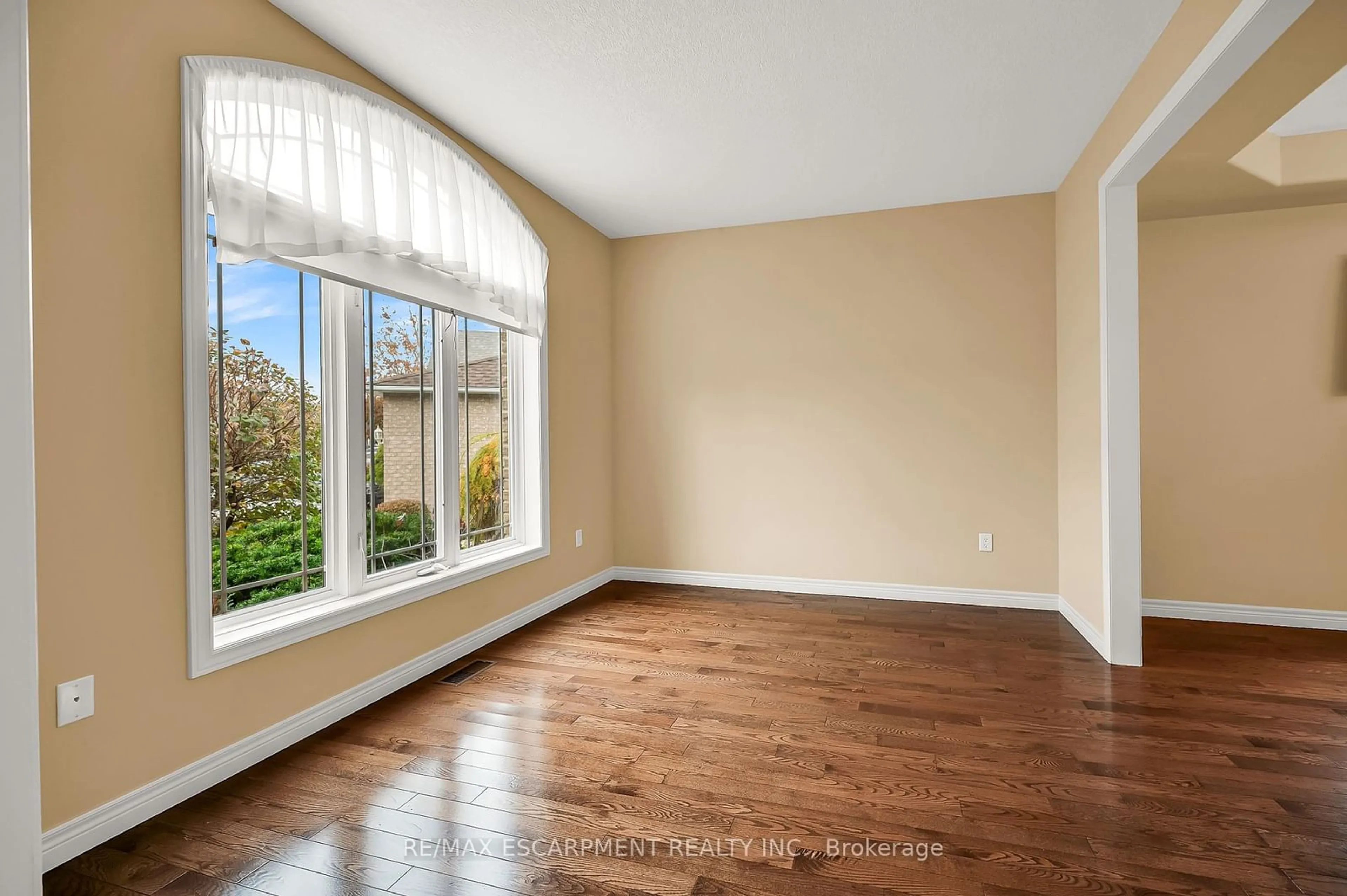 A pic of a room, wood floors for 61 Waterford Cres, Hamilton Ontario L8E 4Z9