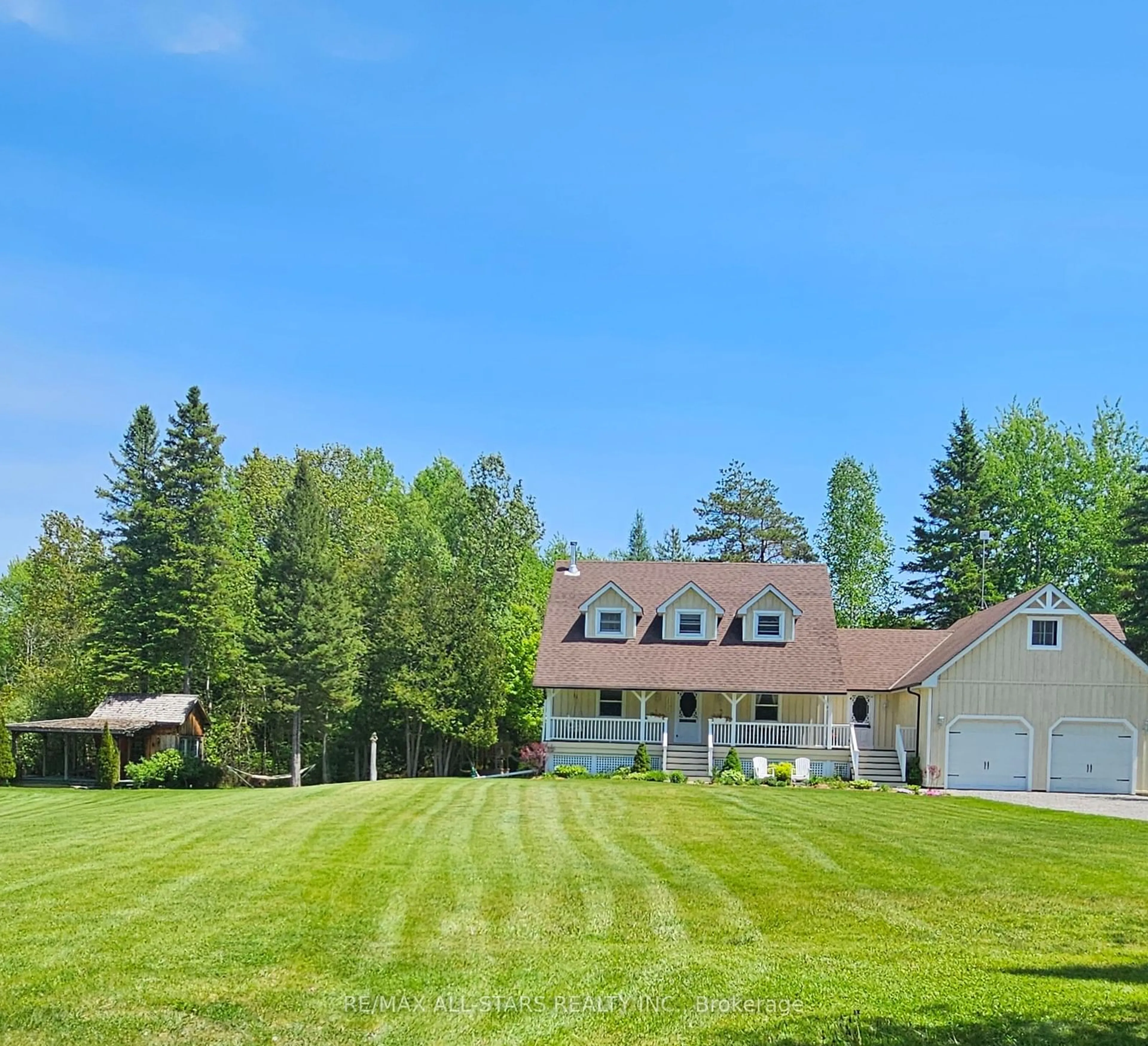 A pic from exterior of the house or condo, the fenced backyard for 930 Killarney Bay Rd, Kawartha Lakes Ontario K0M 1G0