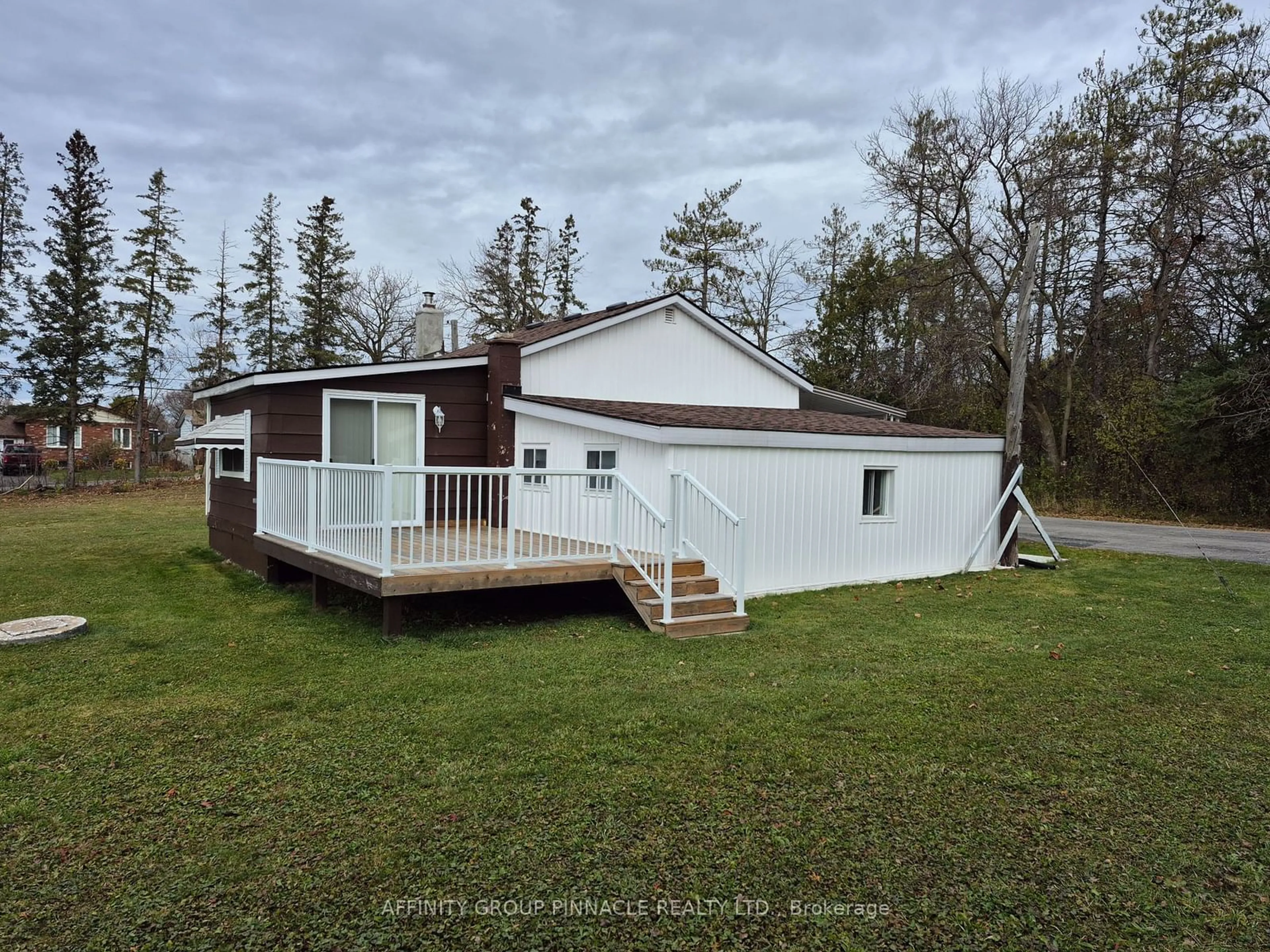 Frontside or backside of a home, cottage for 55 Parkside Dr, Kawartha Lakes Ontario K9V 5Y1