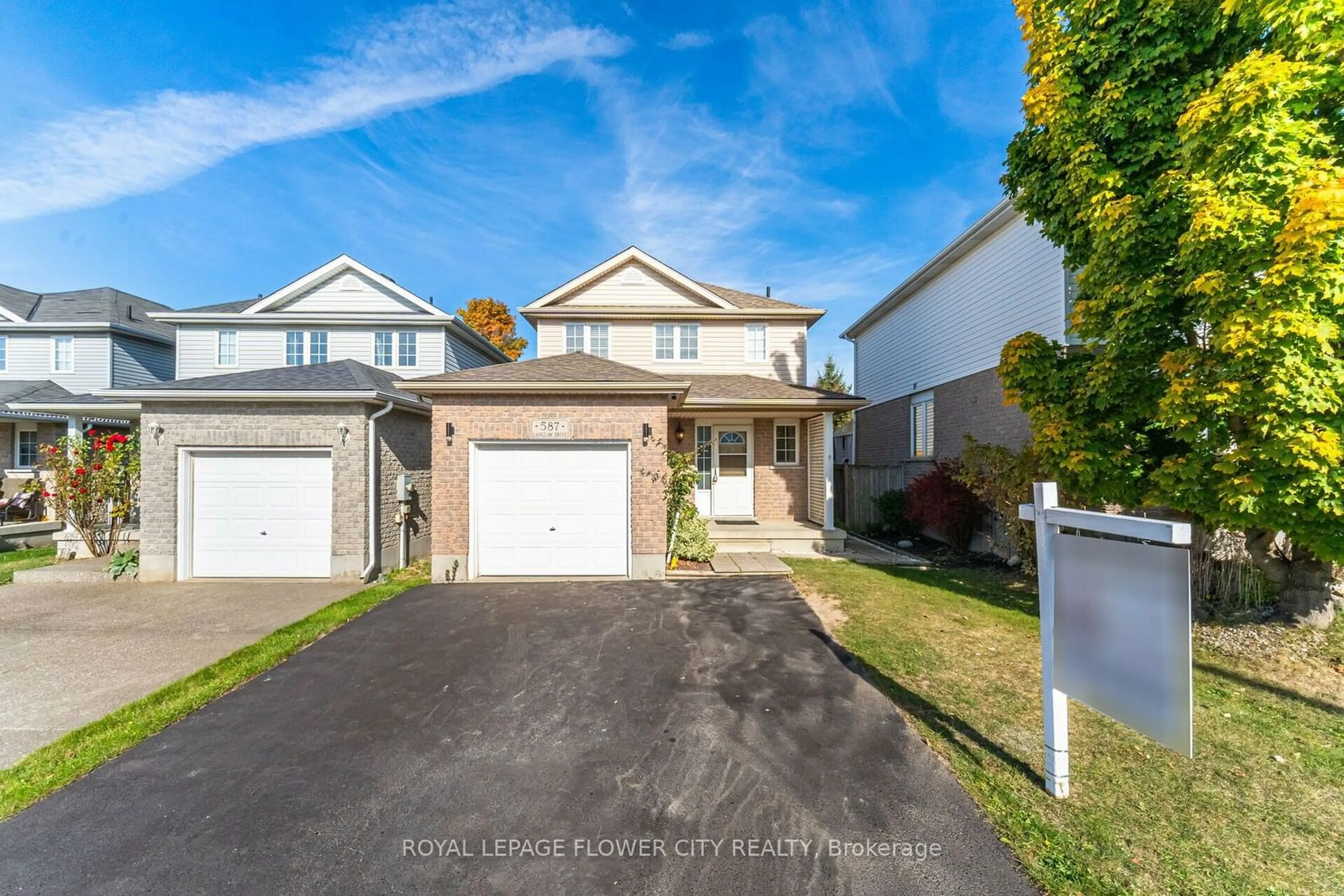 Frontside or backside of a home, the street view for 587 Langlaw Dr, Cambridge Ontario N1P 1H8