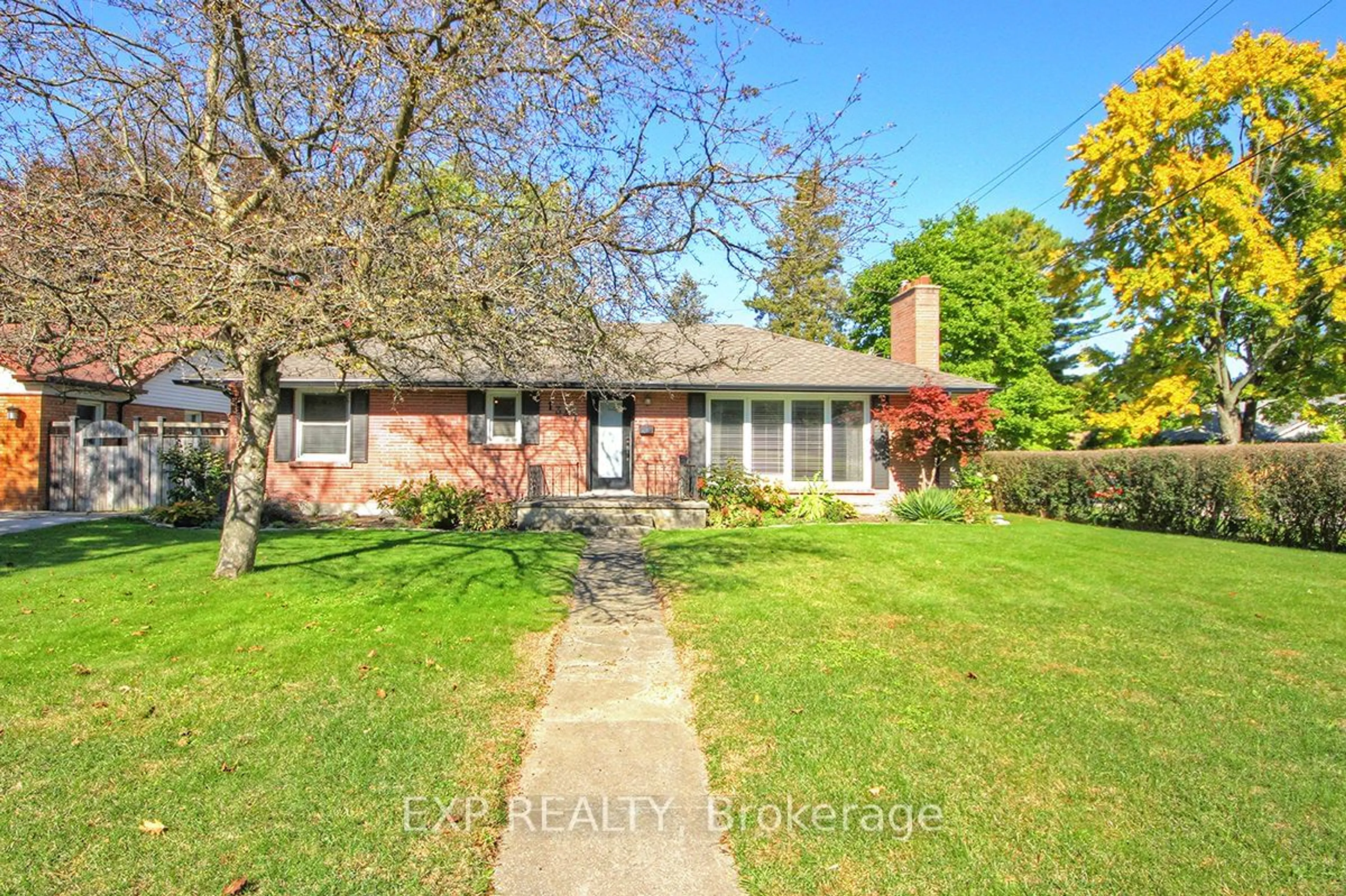 Frontside or backside of a home, the fenced backyard for 1341 Byron Baseline Rd, London Ontario N6K 2E5