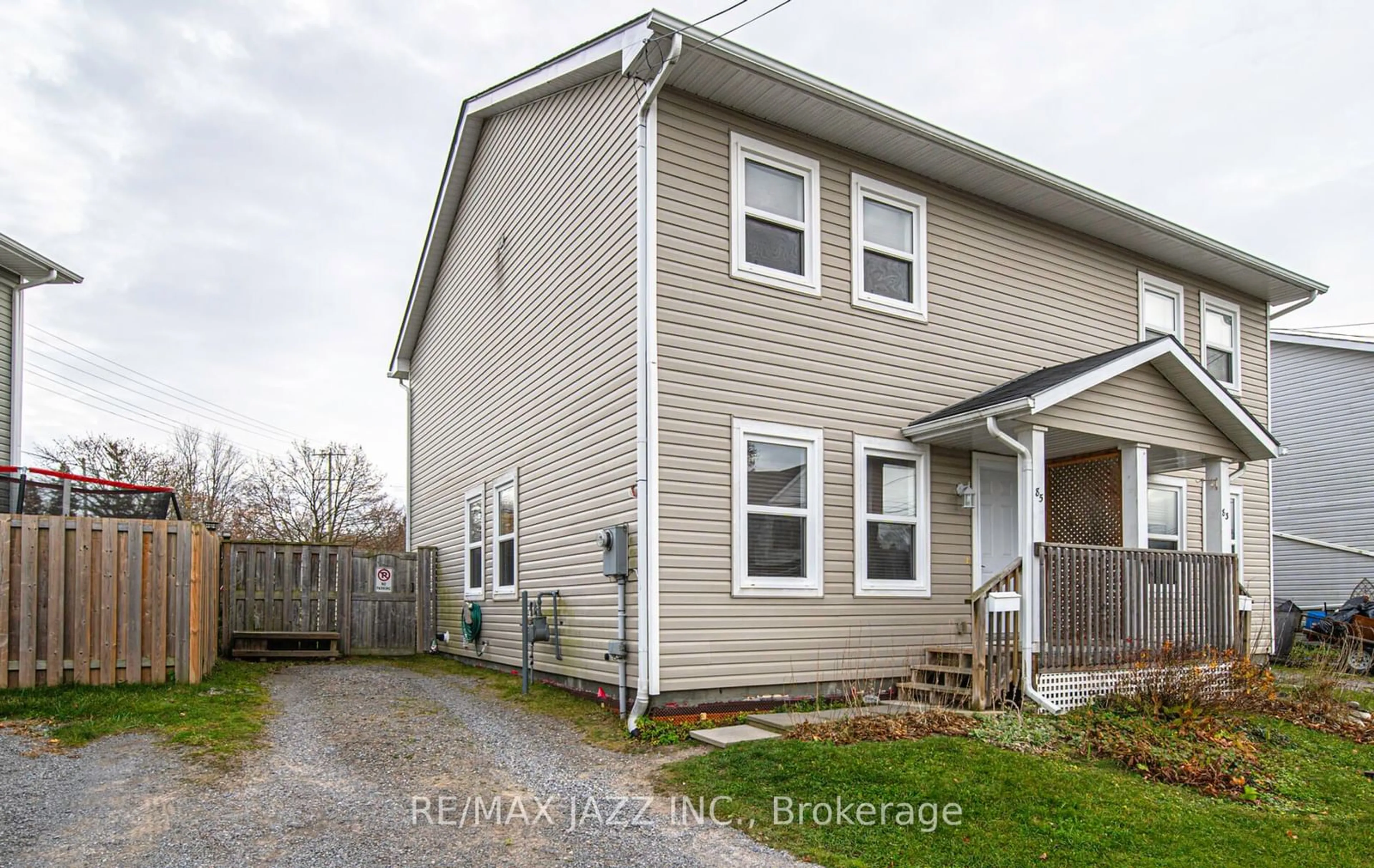 Frontside or backside of a home, the fenced backyard for 85 Harcourt St, Port Hope Ontario L1A 1M3