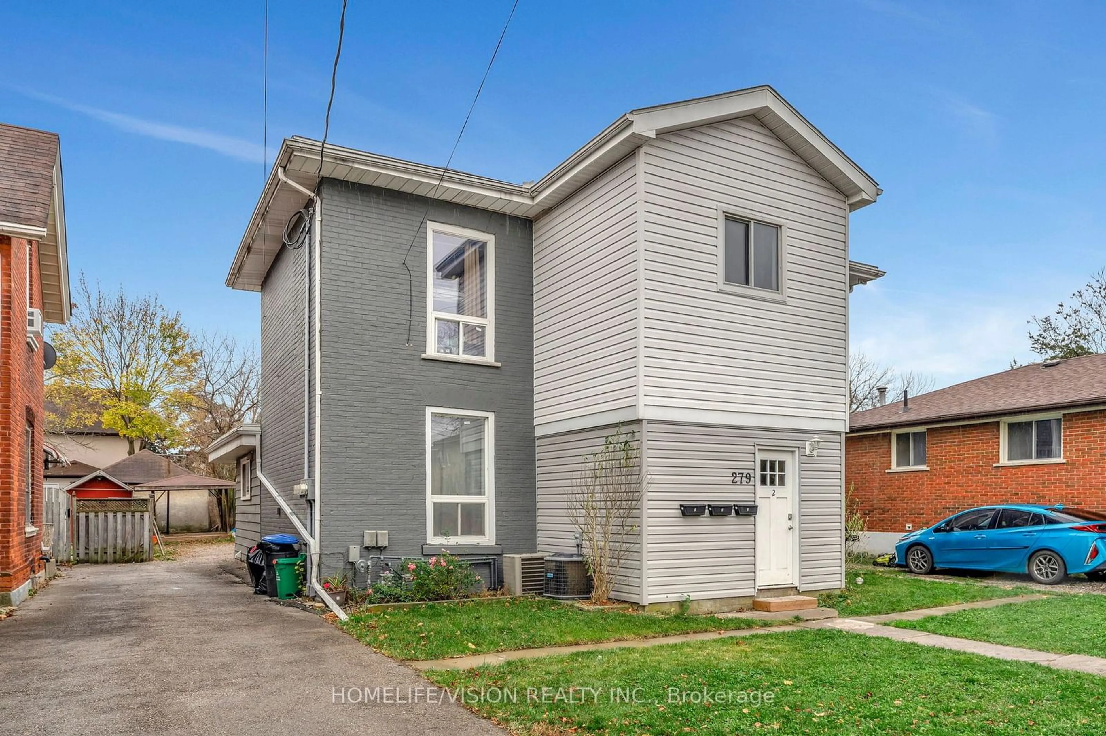 Frontside or backside of a home, the front or back of building for 279 Darling St, Brantford Ontario N3S 3X7