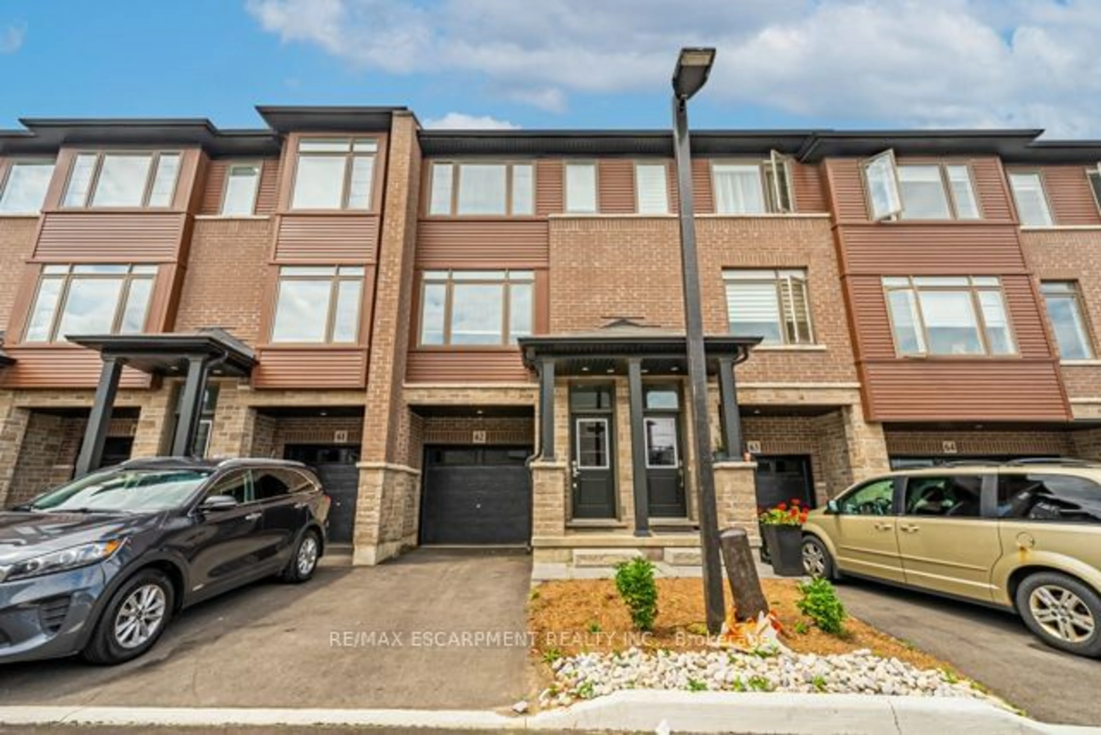 A pic from exterior of the house or condo, the street view for 5000 Connor Dr #62, Lincoln Ontario L3J 0T4