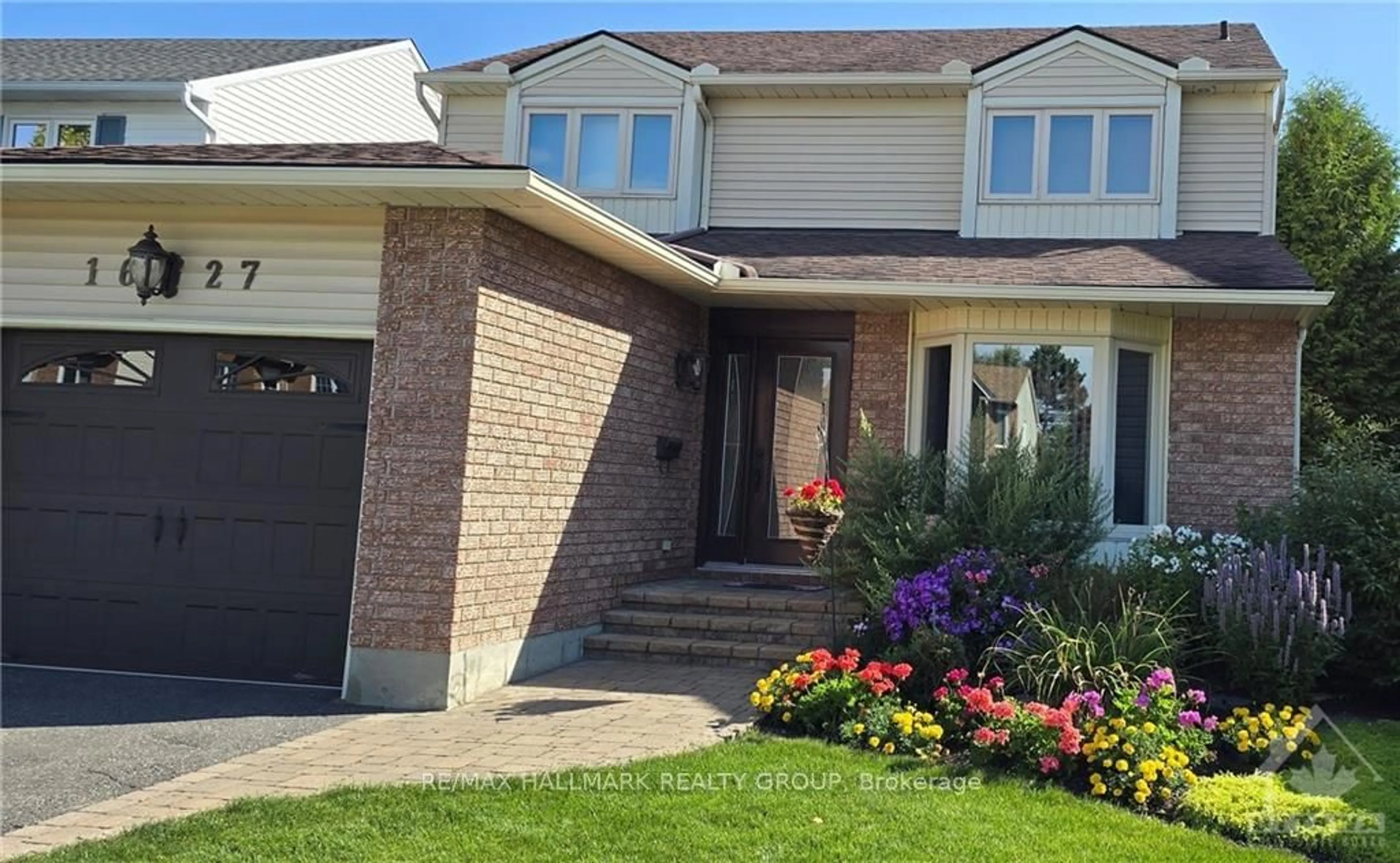 Home with brick exterior material for 1627 CHAMPNEUF Dr, Orleans - Convent Glen and Area Ontario K1C 6C1