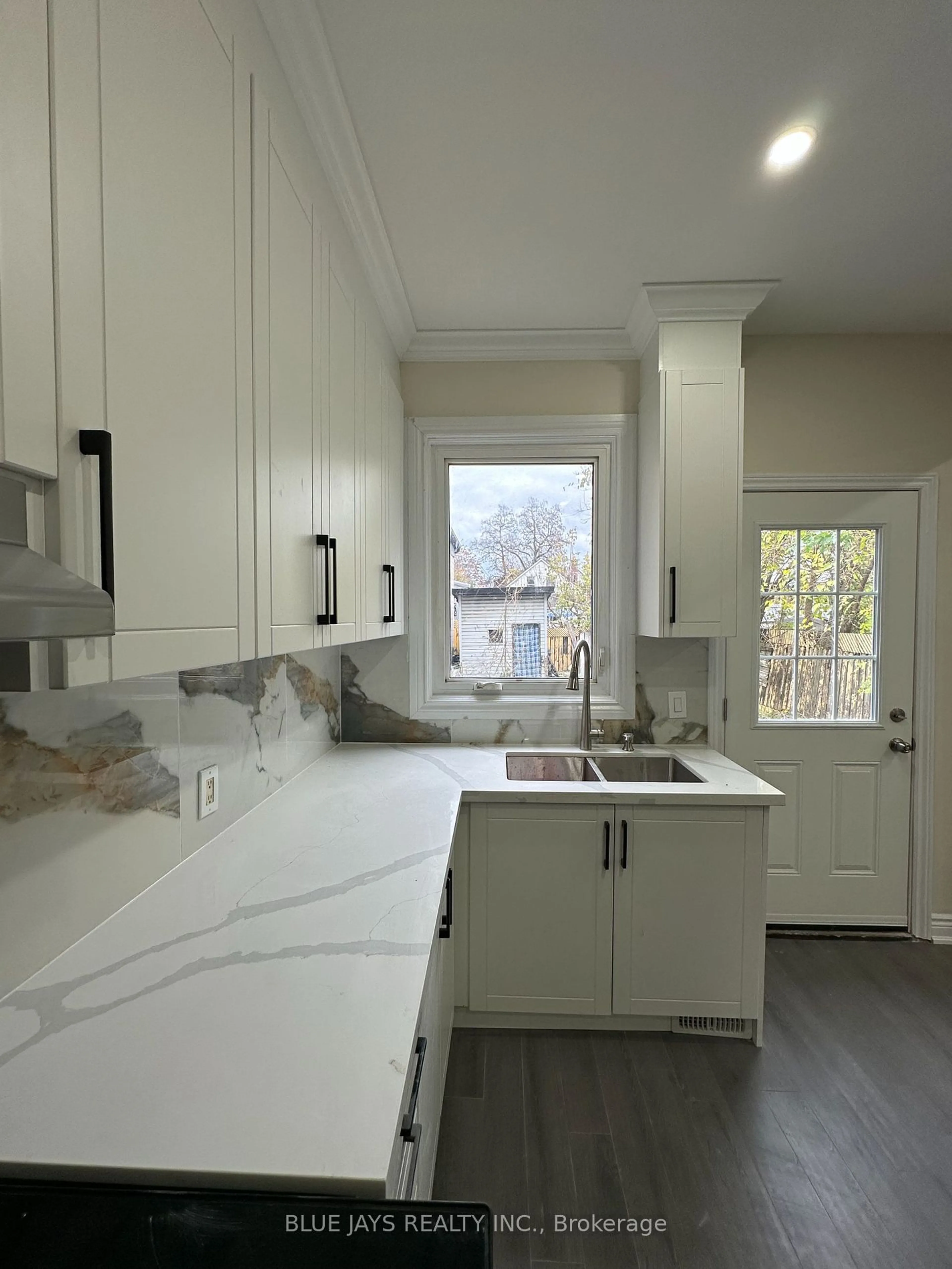 Open concept kitchen for 57 Beach Rd, Hamilton Ontario L8L 3Z6