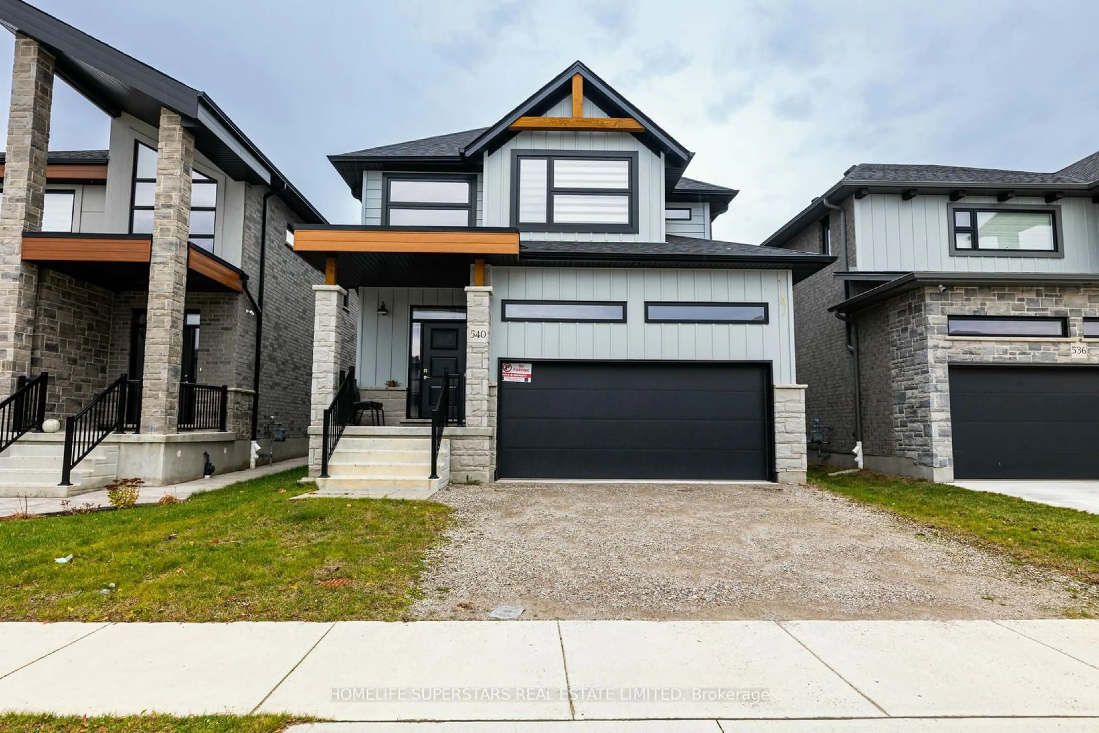 Frontside or backside of a home, the street view for 540 Doonwoods Cres, Kitchener Ontario N2P 0E5