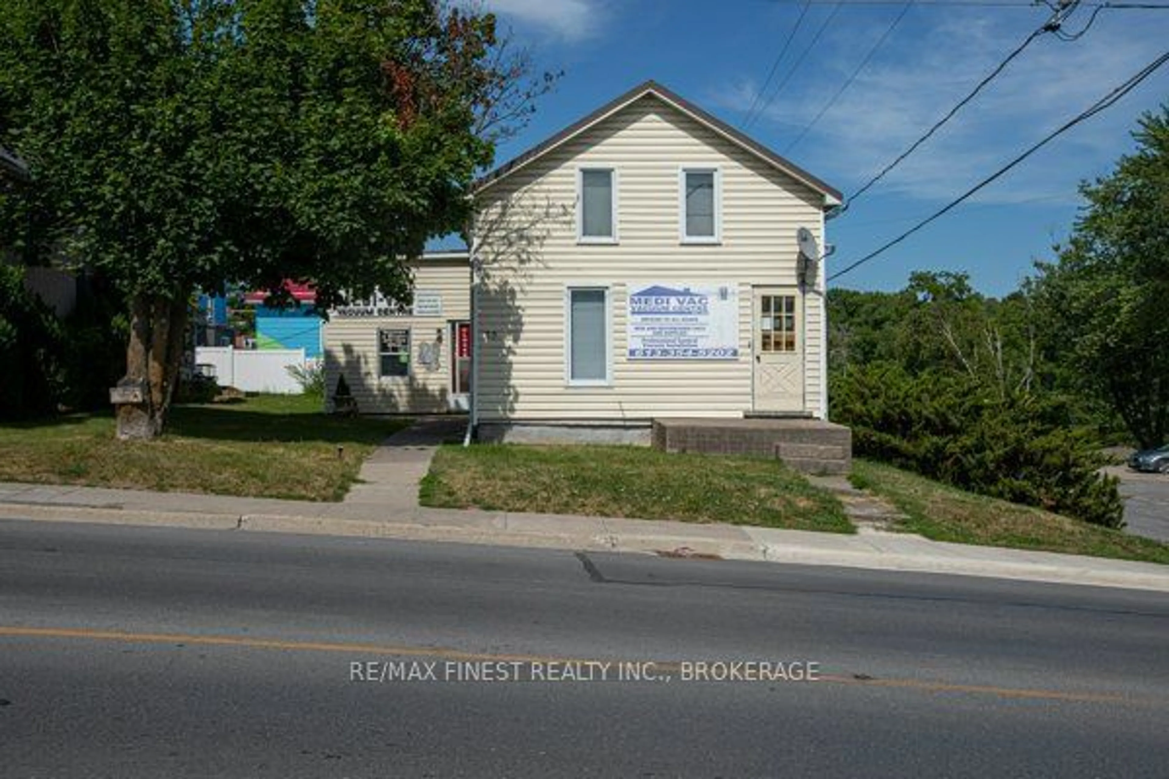 Frontside or backside of a home, the front or back of building for 59 CENTRE St, Greater Napanee Ontario K7R 1M8