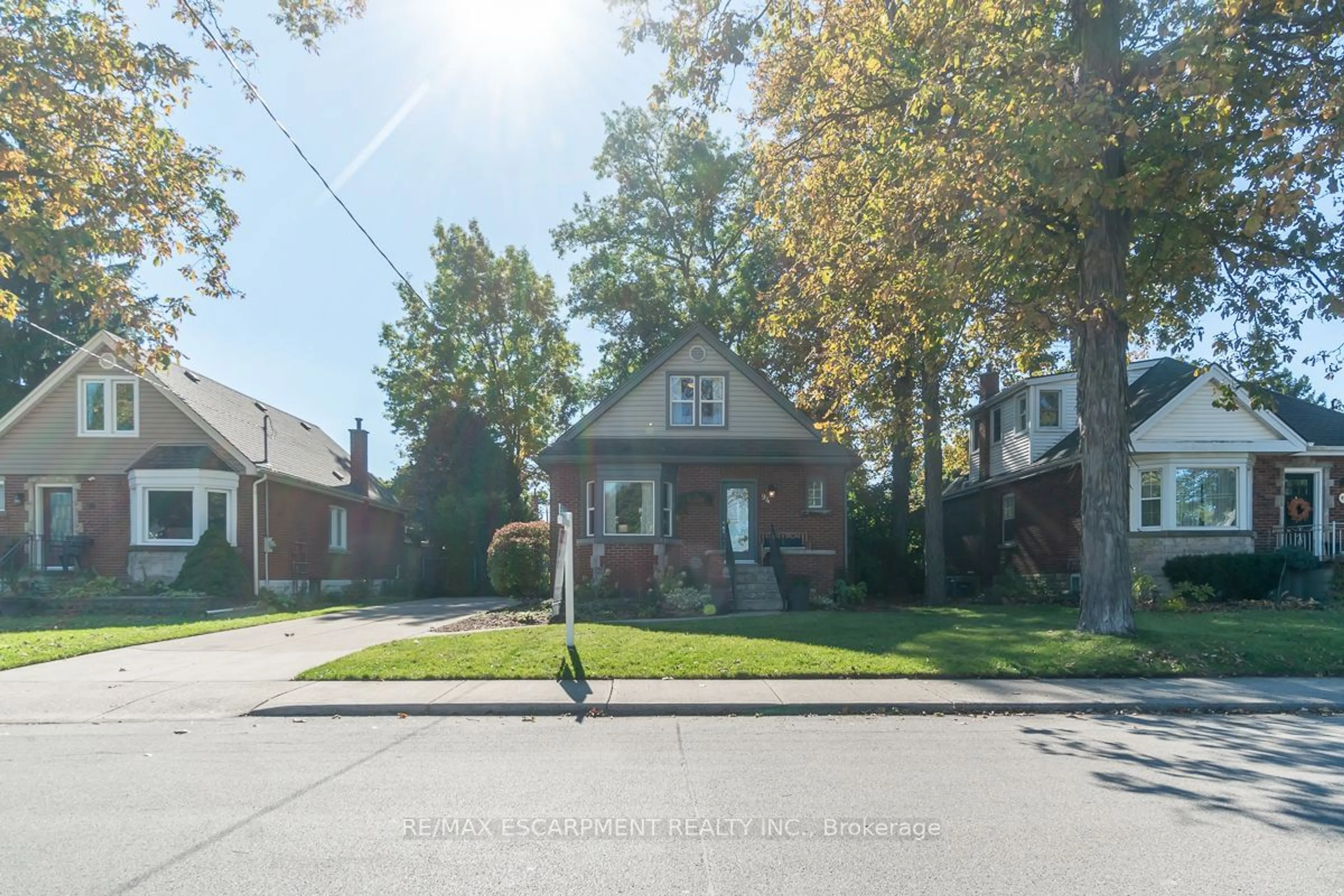 Frontside or backside of a home, the street view for 94 Queensdale Ave, Hamilton Ontario L9A 1K3