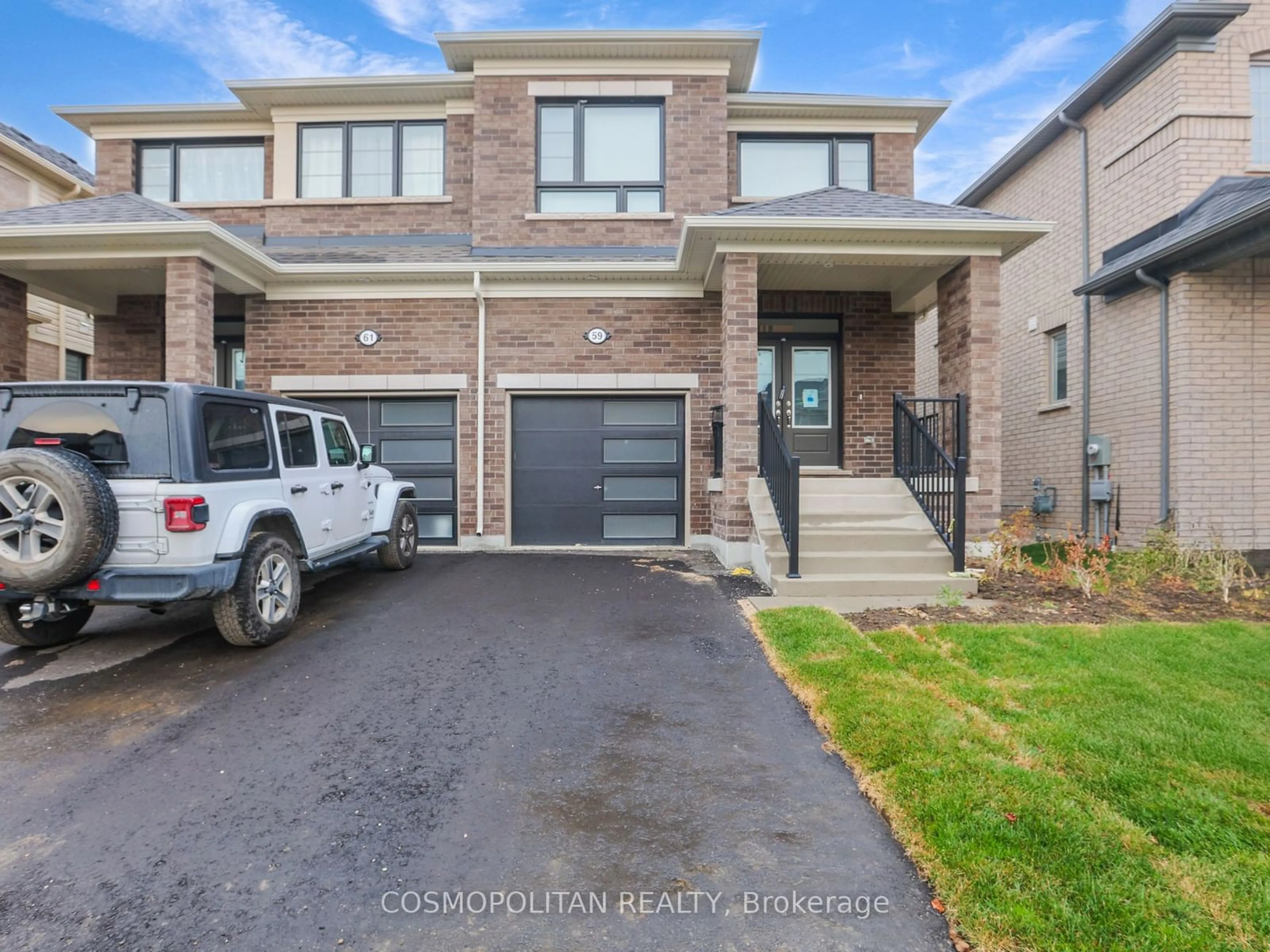 Home with brick exterior material for 59 Gauley Dr, Centre Wellington Ontario N1M 2W3