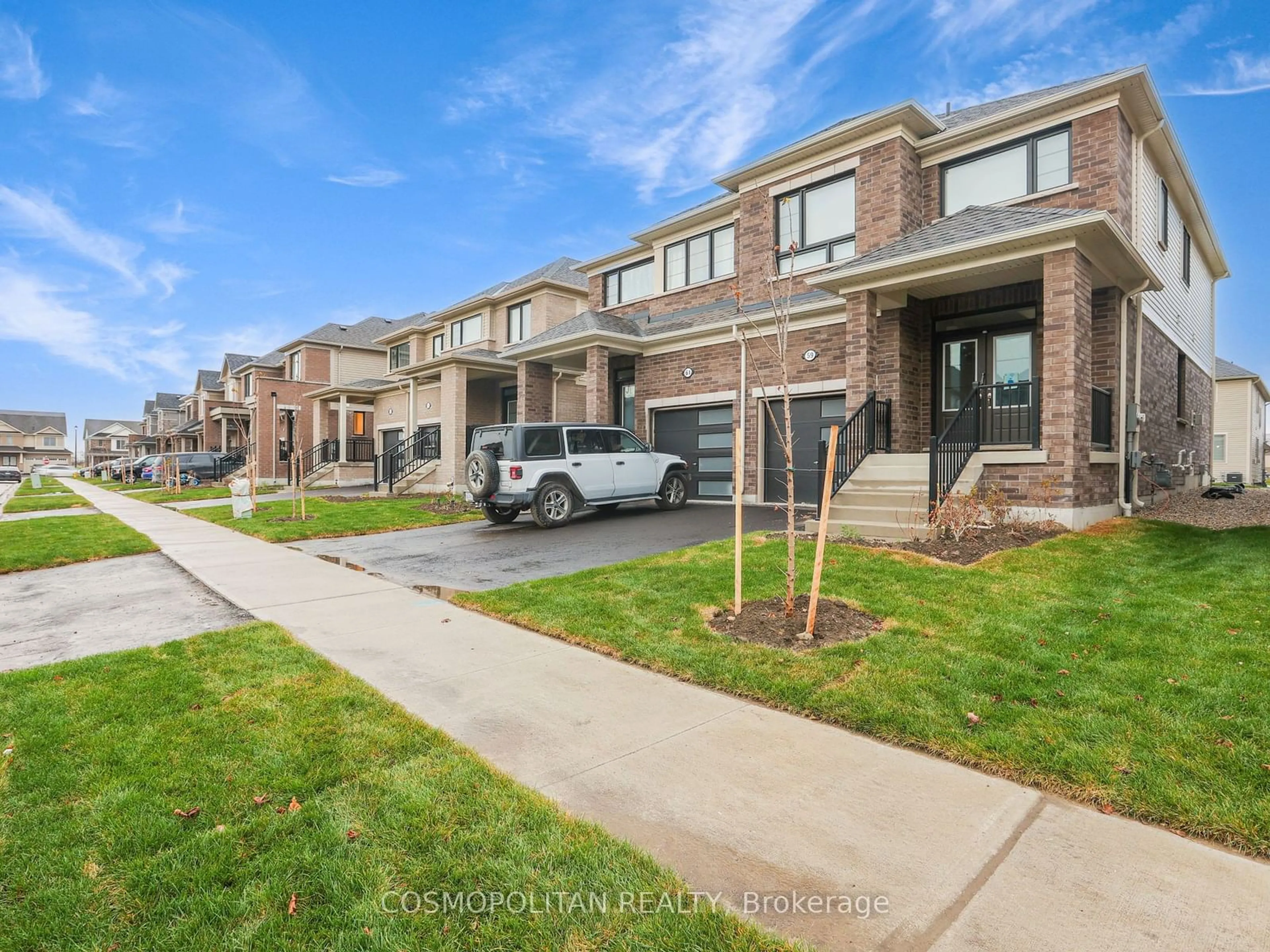 A pic from exterior of the house or condo, the street view for 59 Gauley Dr, Centre Wellington Ontario N1M 2W3