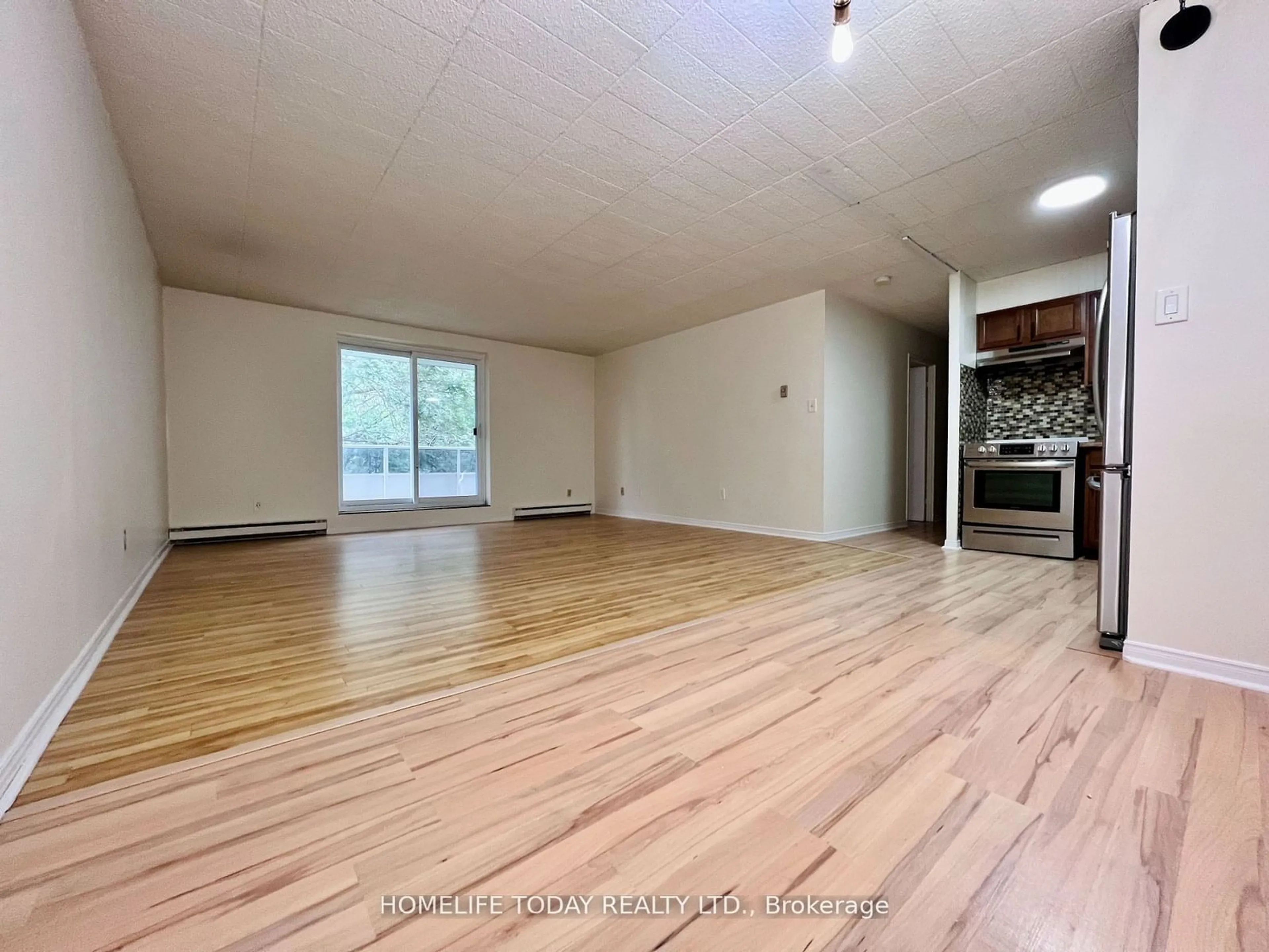 A pic of a room, wood floors for 71 Vanier Dr #204, Kitchener Ontario N2C 1J4