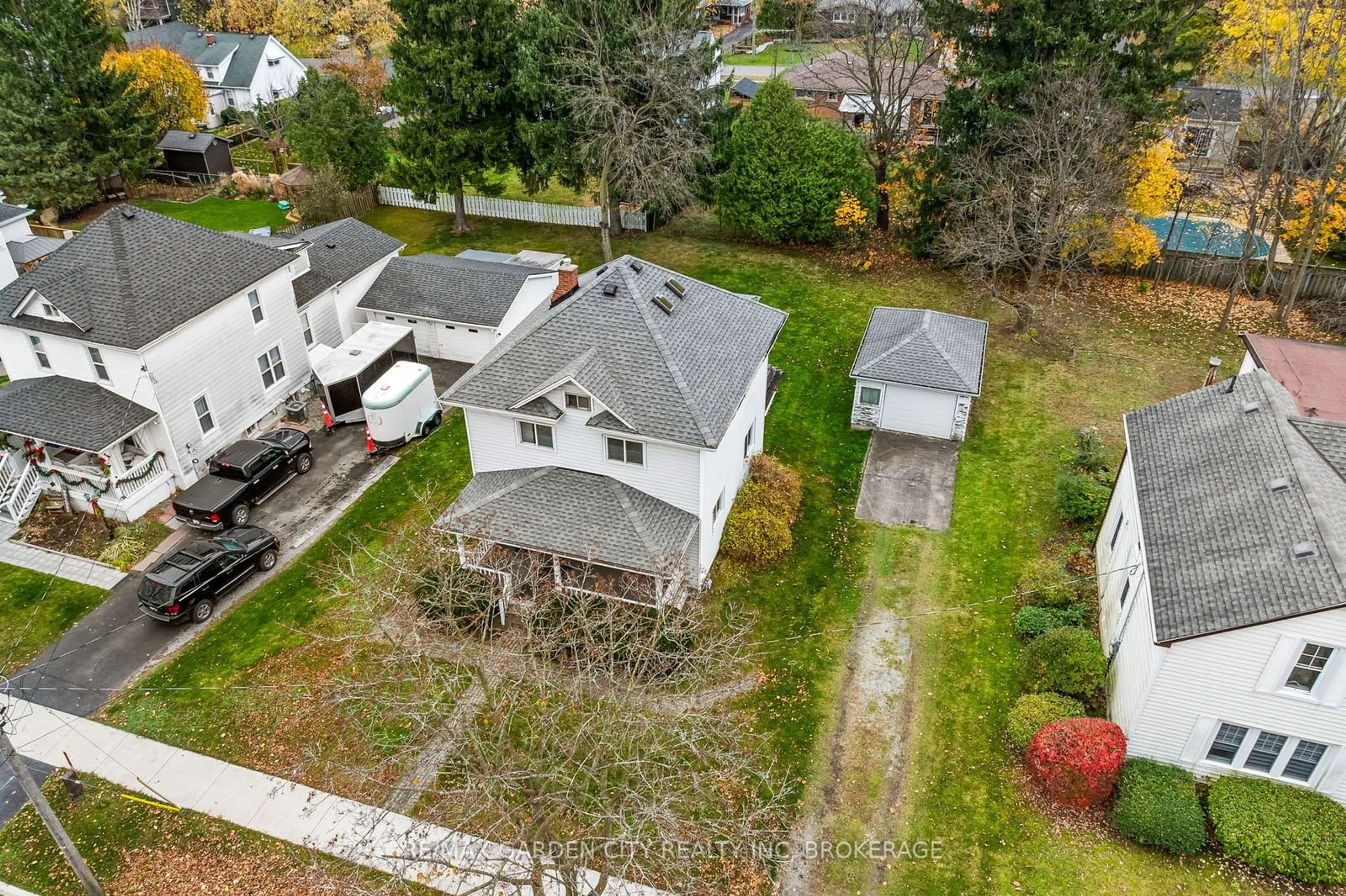 Frontside or backside of a home, the fenced backyard for 1561 Pelham St, Pelham Ontario L0S 1E3