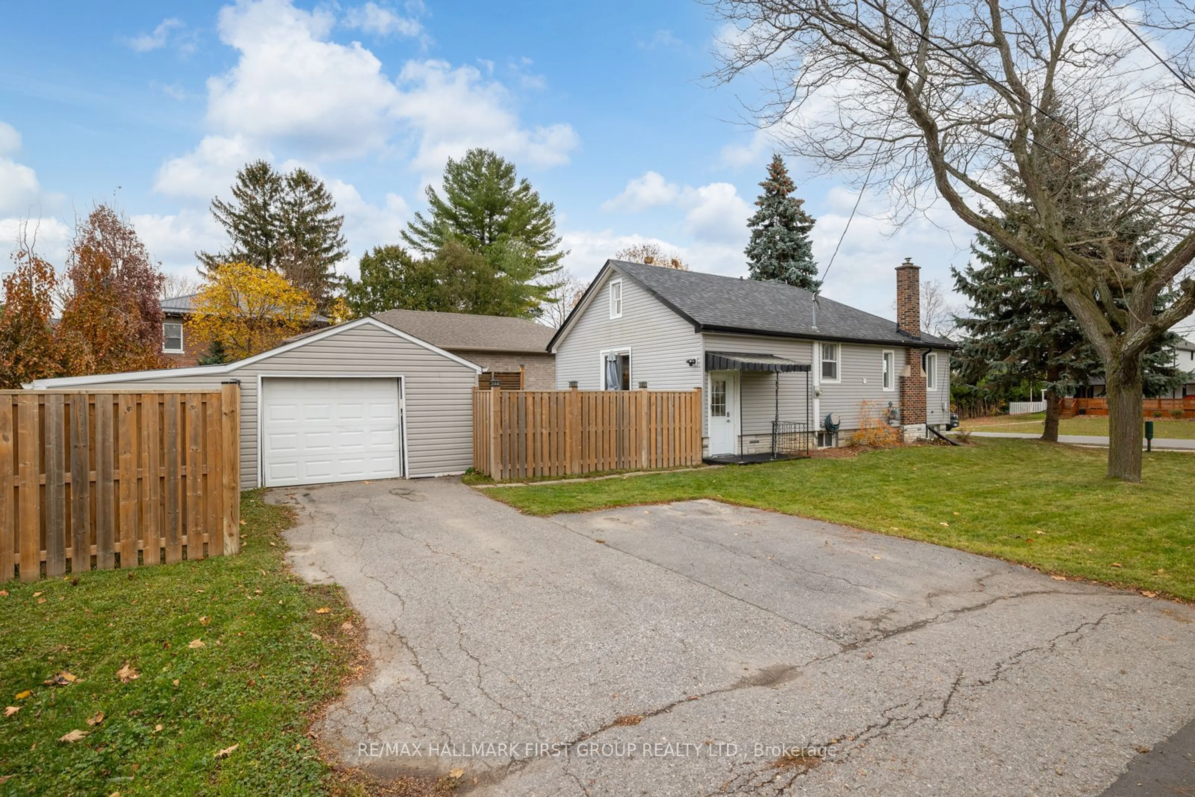 Frontside or backside of a home, the fenced backyard for 28 William St, Port Hope Ontario L1A 1K2