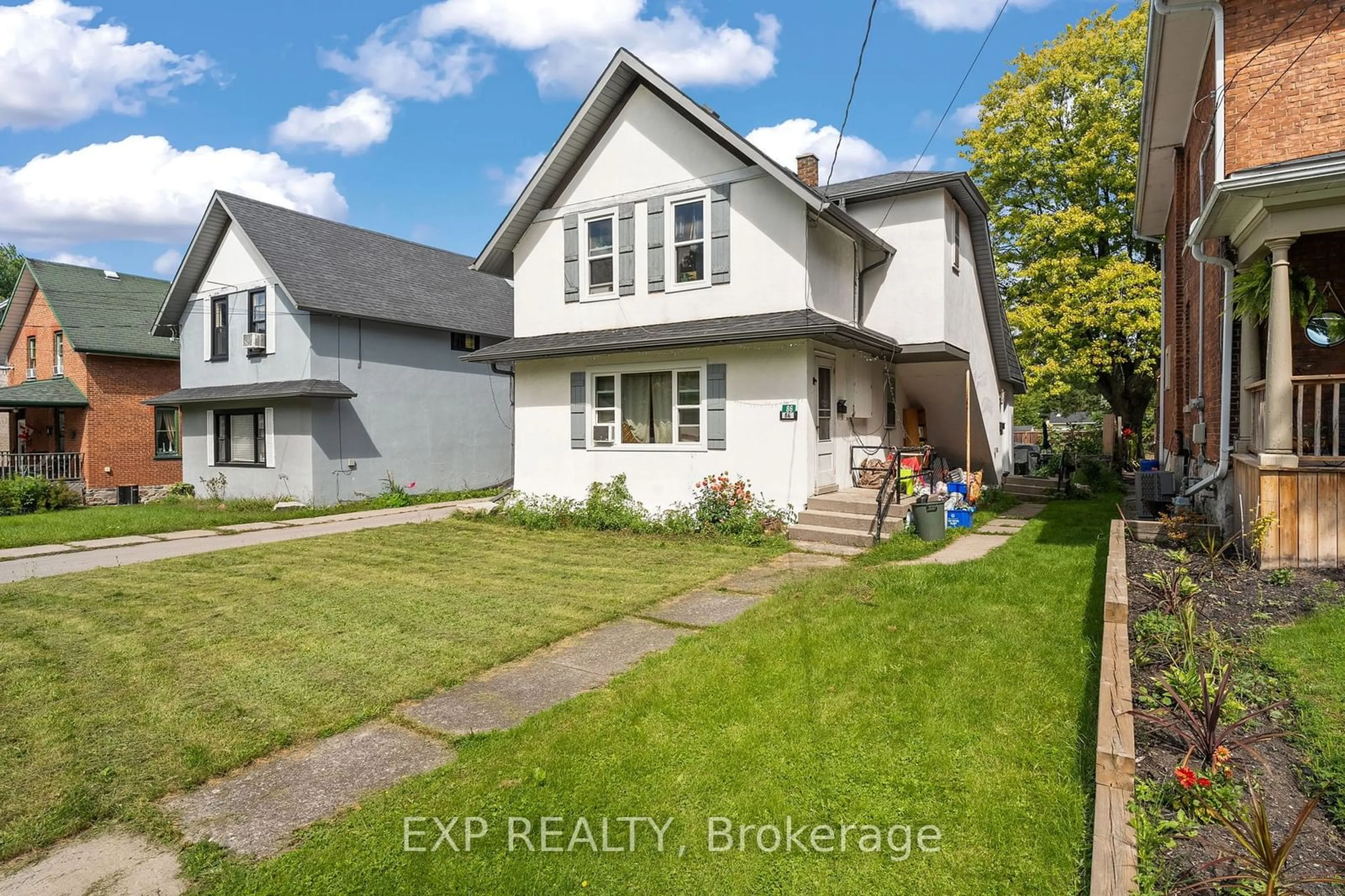 Frontside or backside of a home, the street view for 86 Queen St, Kawartha Lakes Ontario K9V 1G4