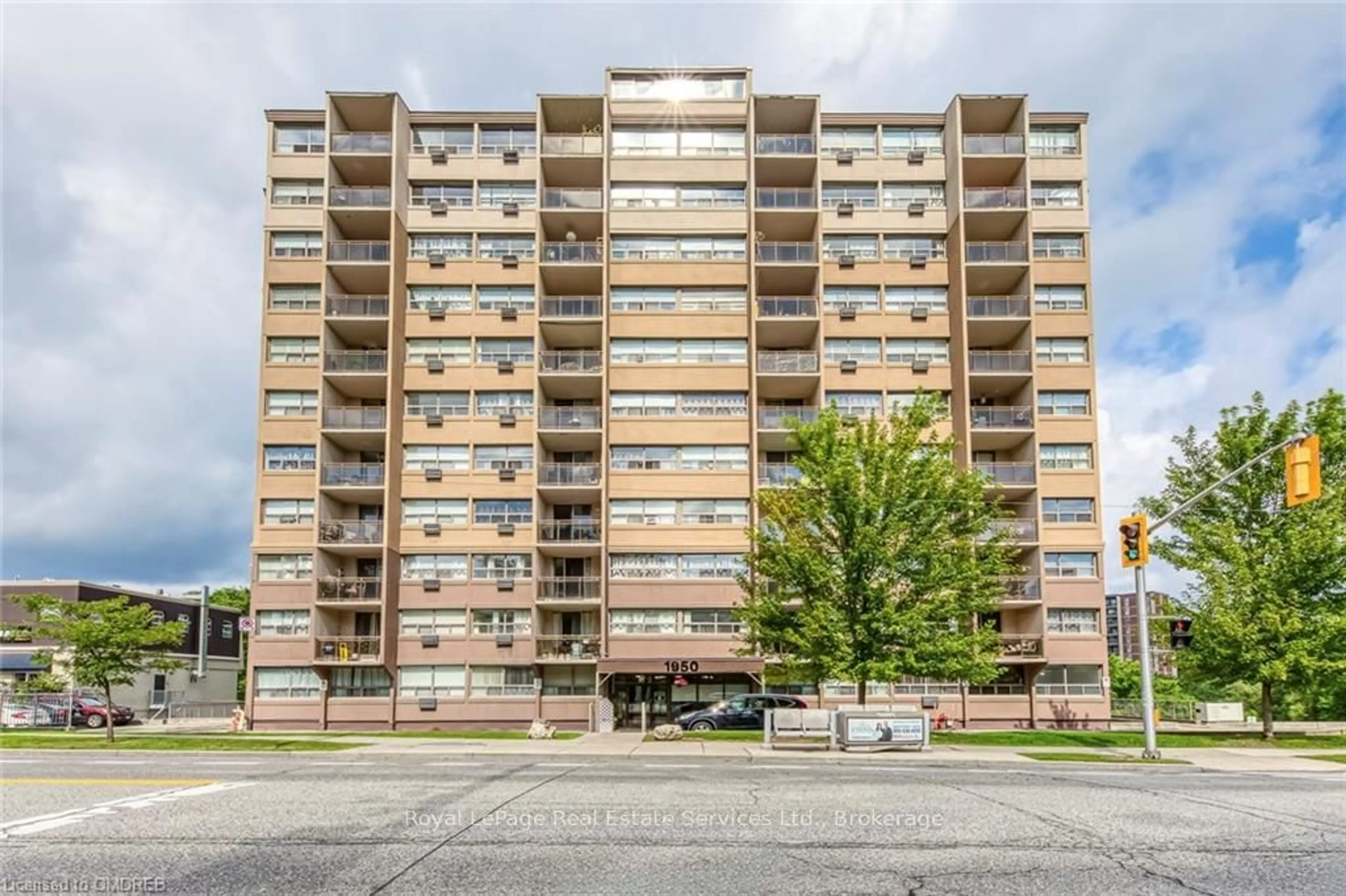 A pic from exterior of the house or condo, the front or back of building for 1950 MAIN St #204, Hamilton Ontario L8S 4M9