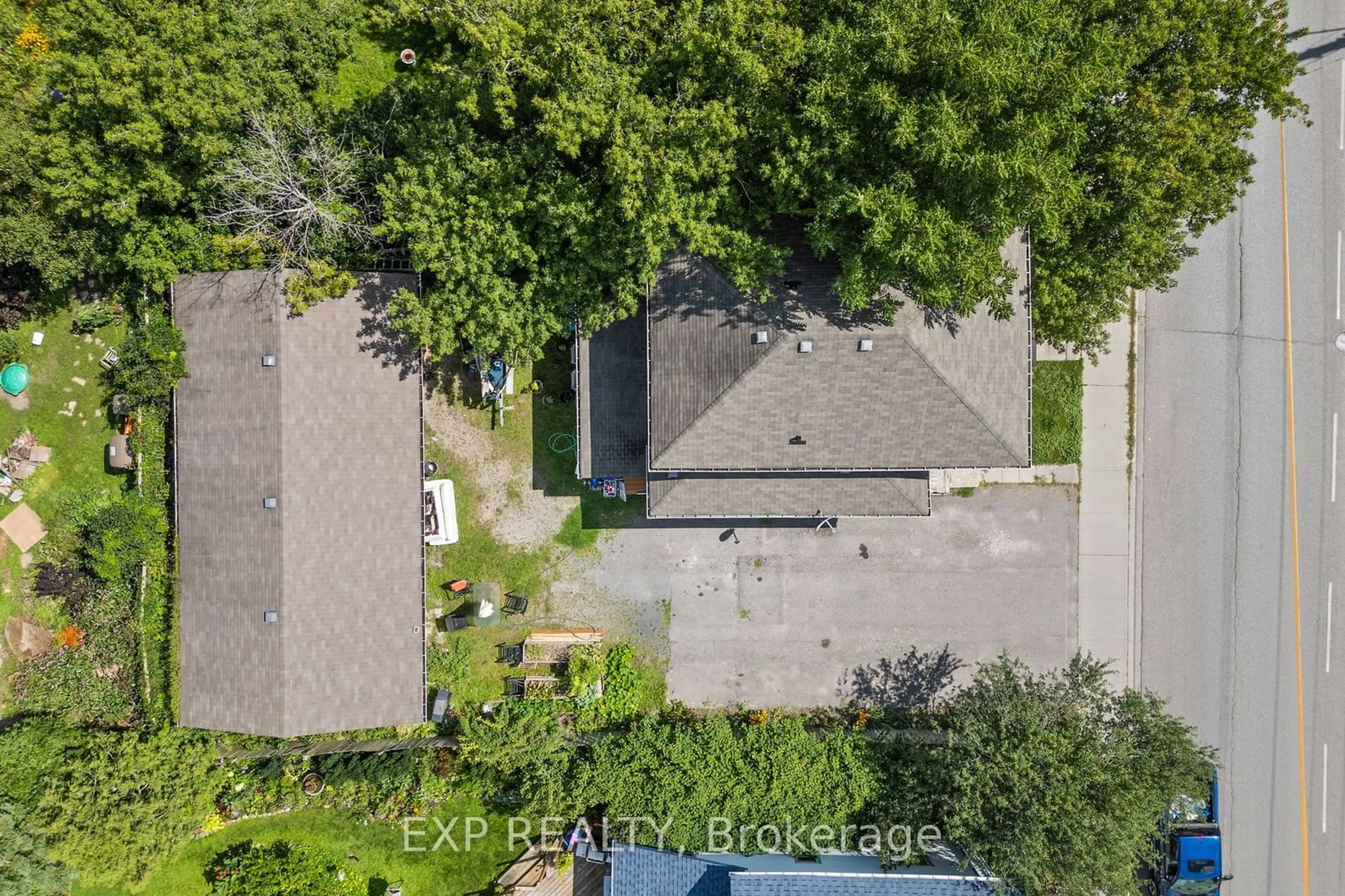 Frontside or backside of a home, the fenced backyard for 4 Mary St, Kawartha Lakes Ontario K9V 2N4