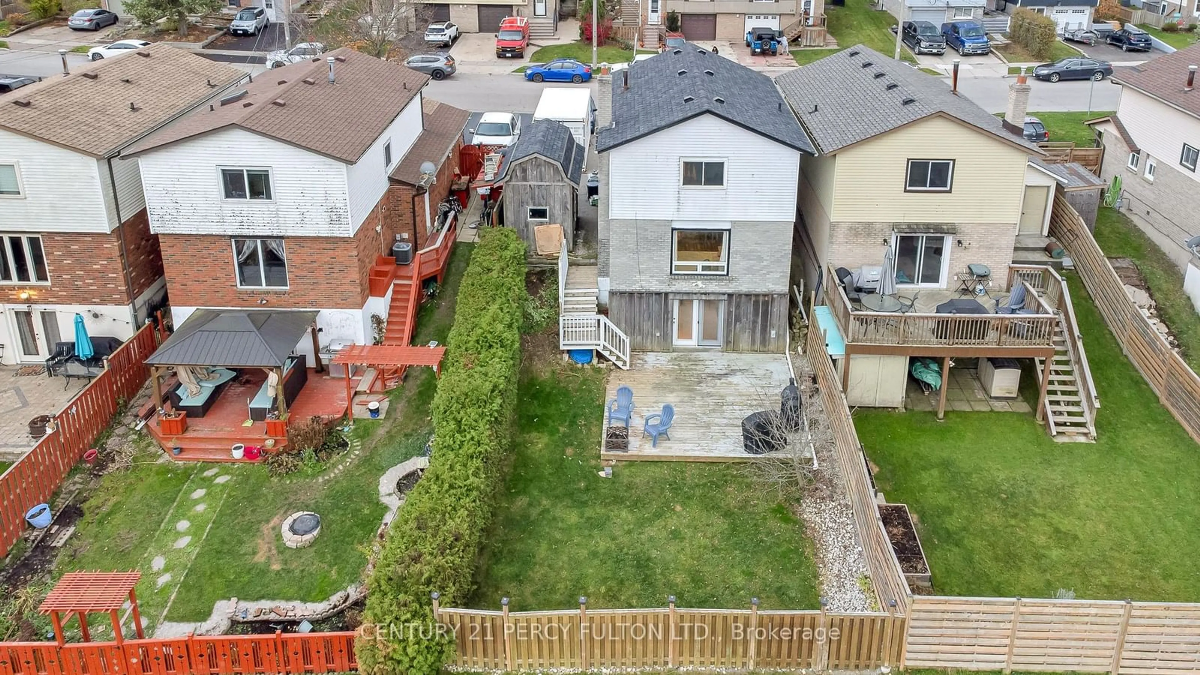 Frontside or backside of a home, the fenced backyard for 37 Burke Dr, Haldimand Ontario N3W 1C3