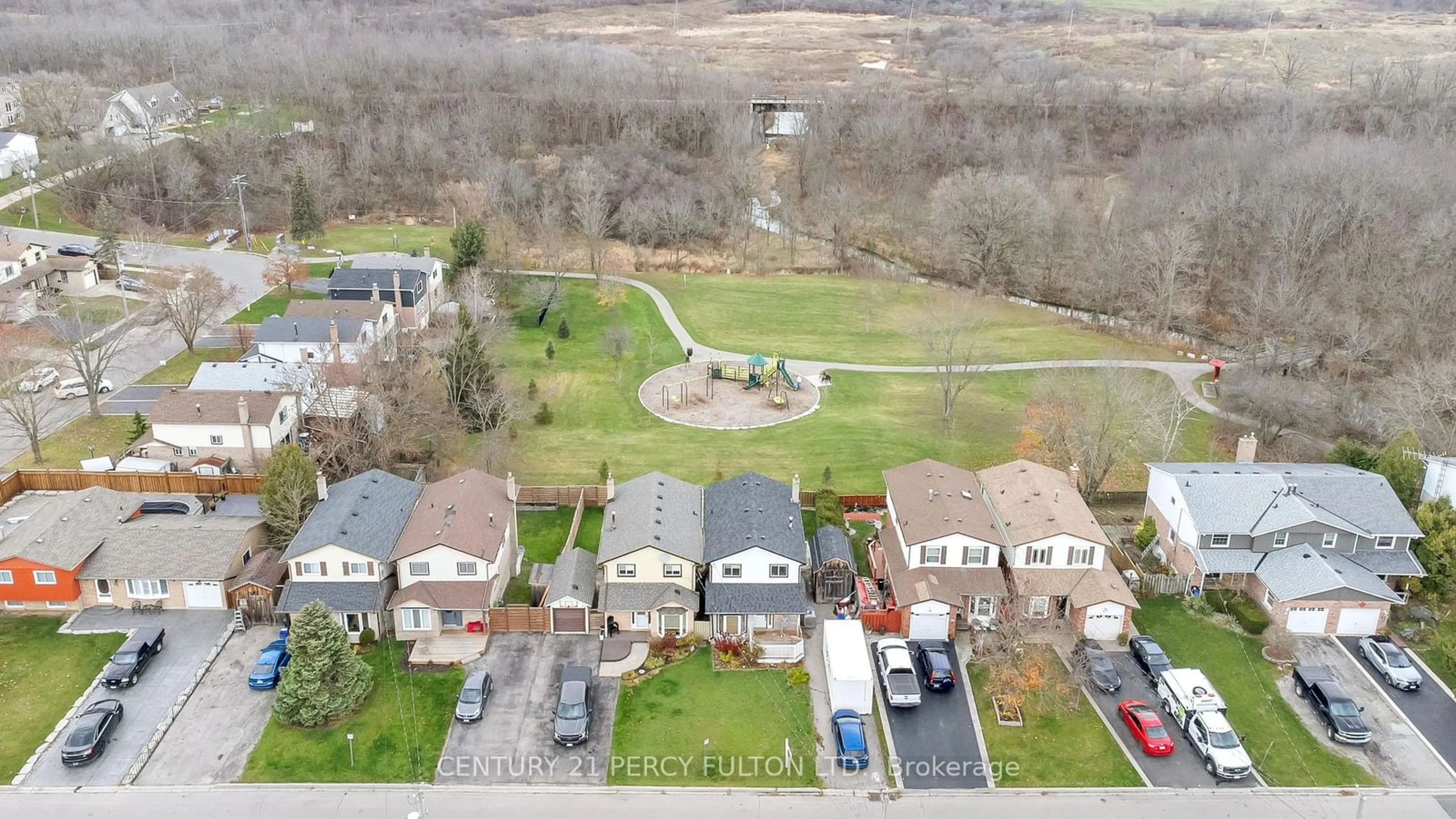 Frontside or backside of a home, the fenced backyard for 37 Burke Dr, Haldimand Ontario N3W 1C3