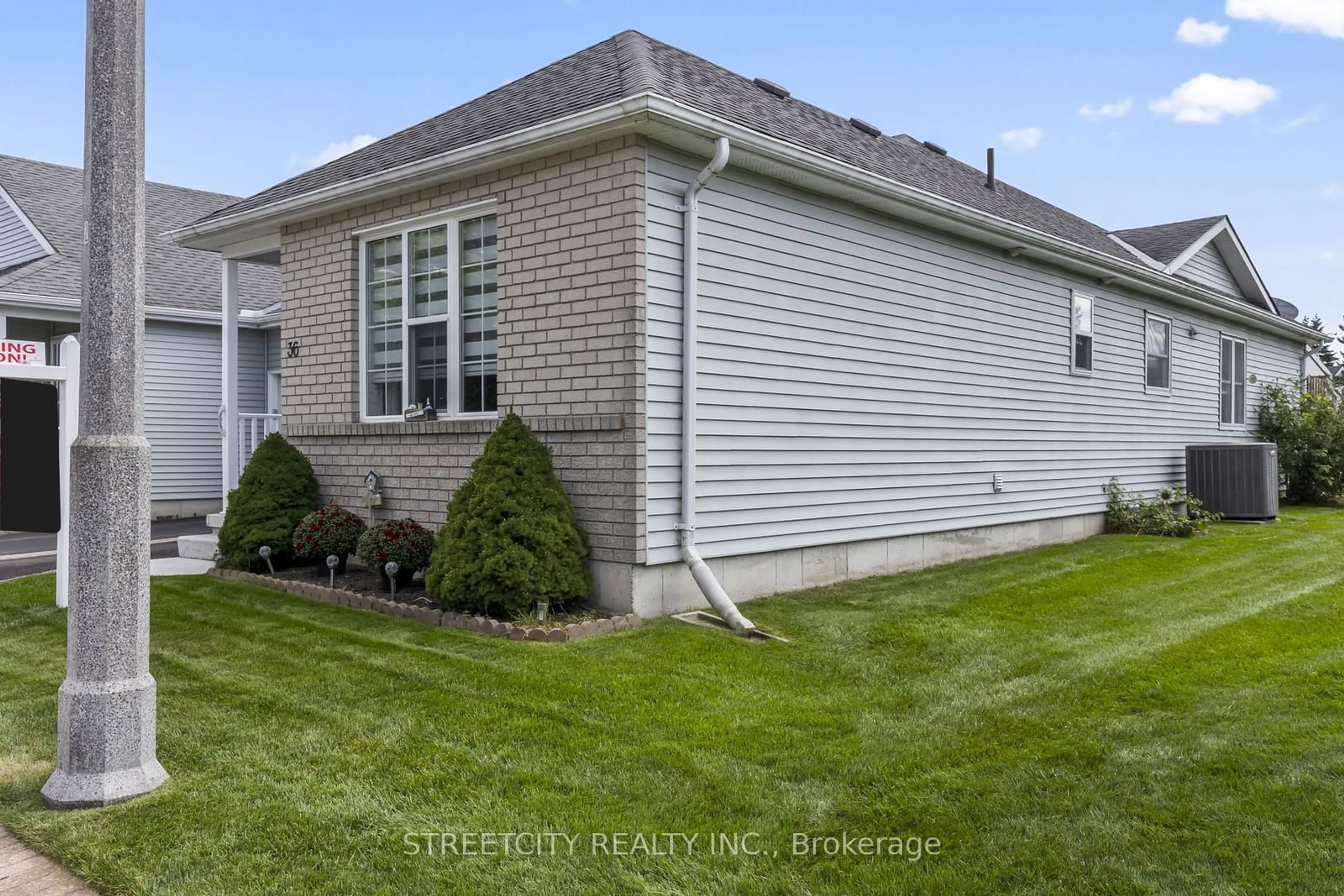 Frontside or backside of a home, the fenced backyard for 36 Jackson Crt, Tillsonburg Ontario N4G 5R3