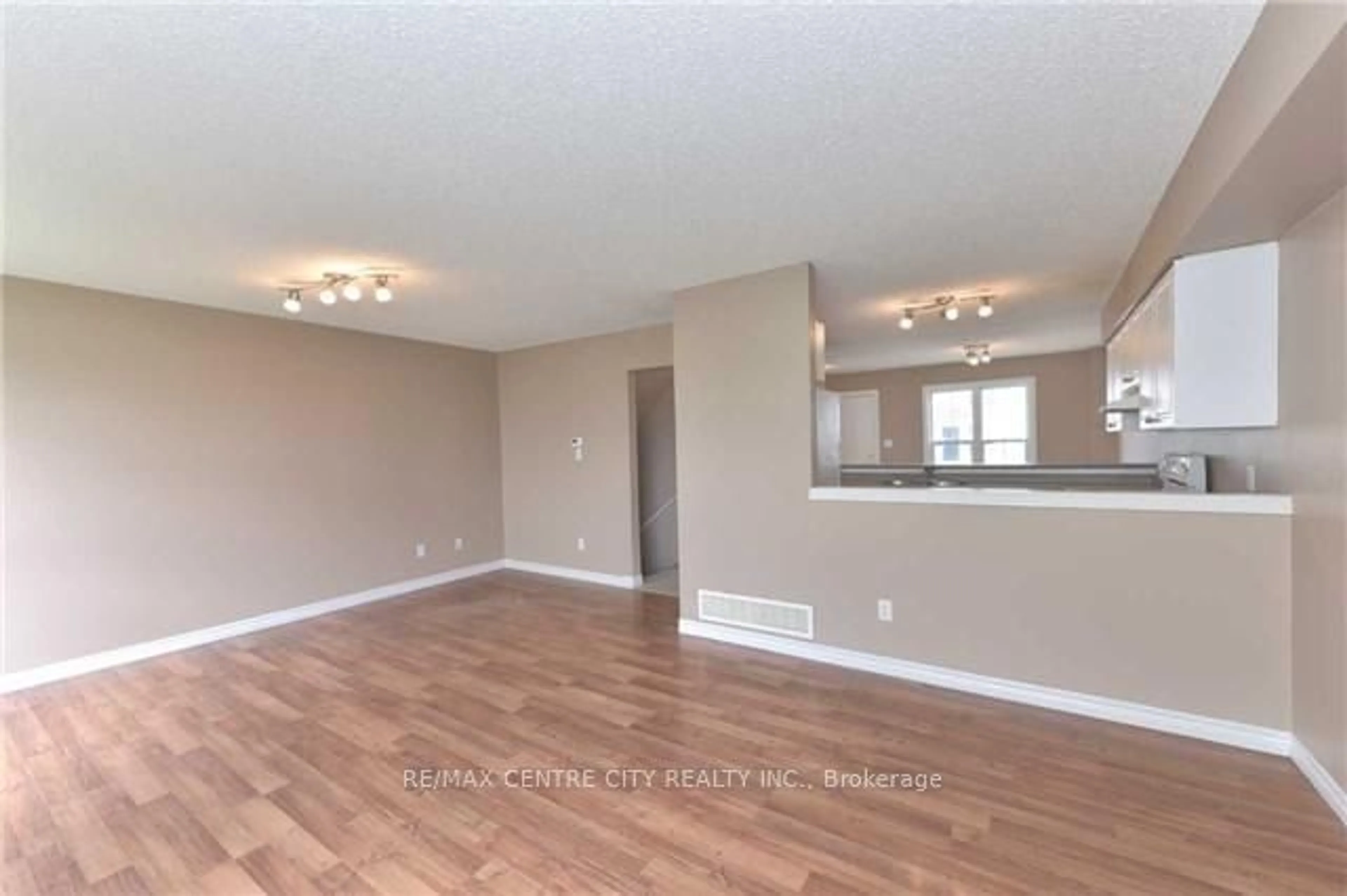 A pic of a room, wood floors for 600 Sarnia Rd #31, London Ontario N6G 5M4