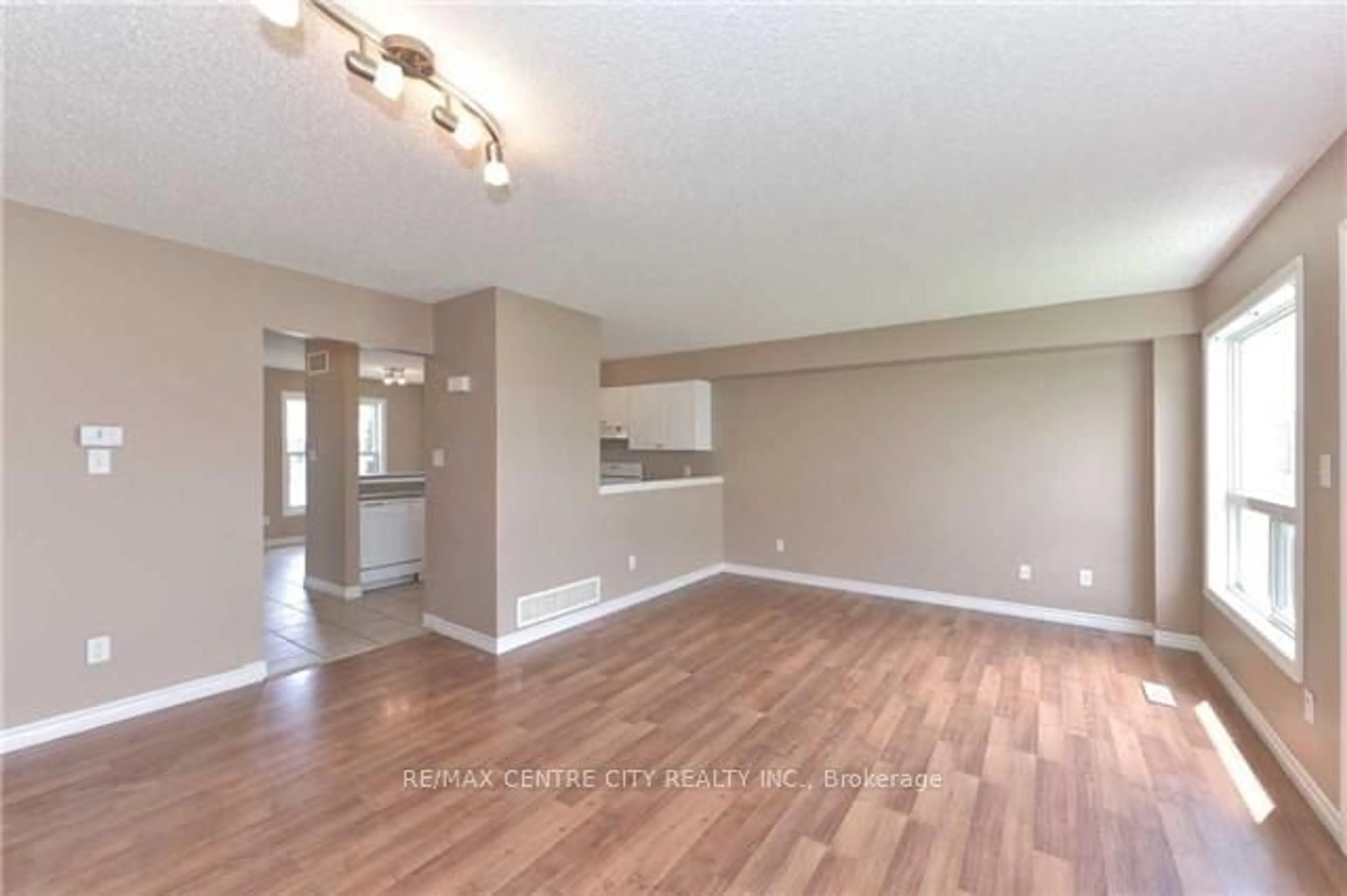 A pic of a room, wood floors for 600 Sarnia Rd #31, London Ontario N6G 5M4