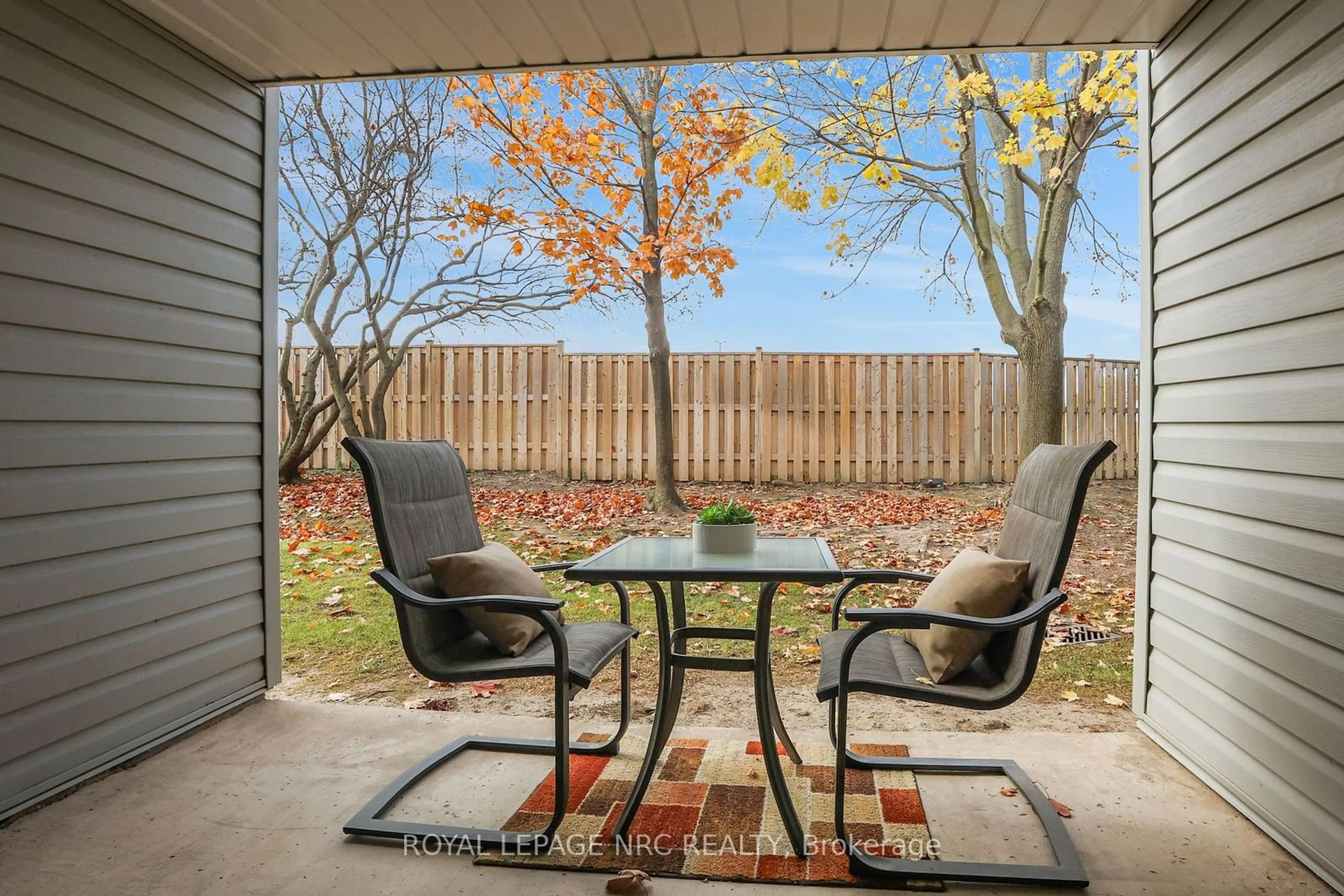 Patio, the fenced backyard for 189 Dorchester Blvd #102, St. Catharines Ontario L2M 7V8