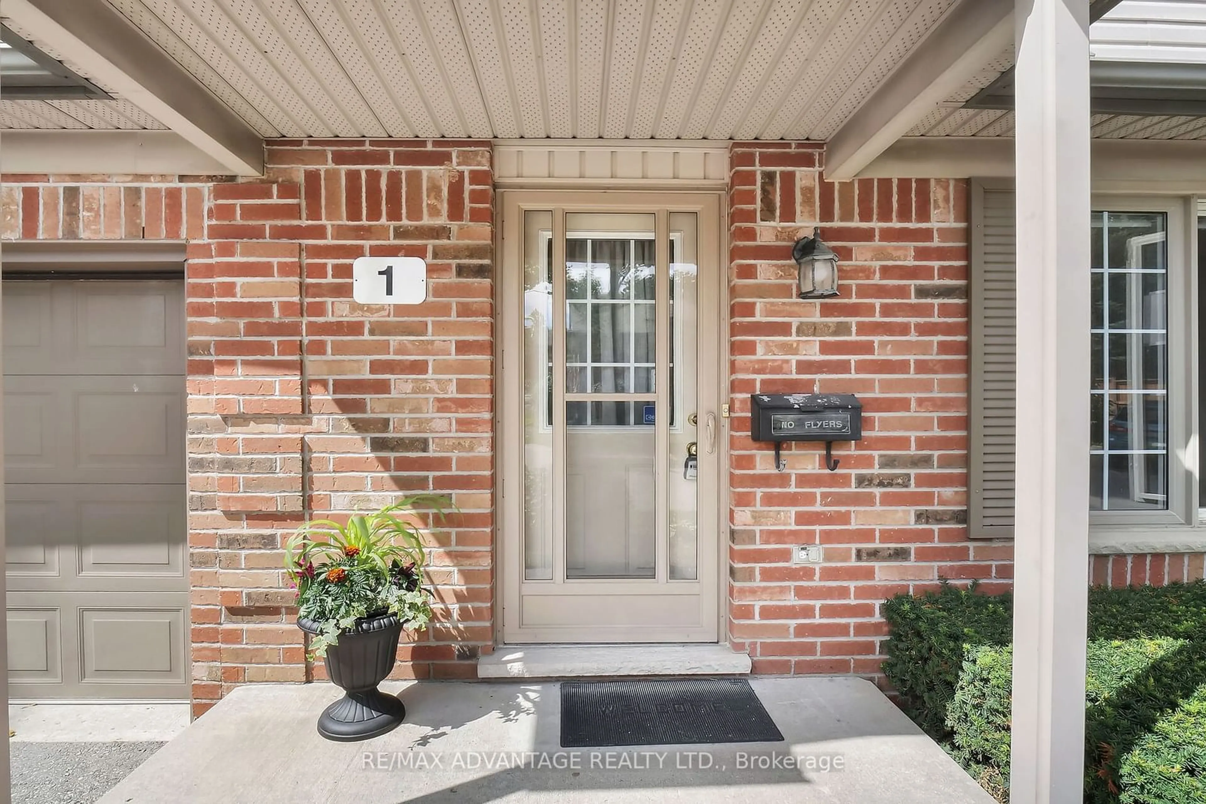 Home with brick exterior material for 515 Proudfoot Lane #1, London Ontario N6H 5N9