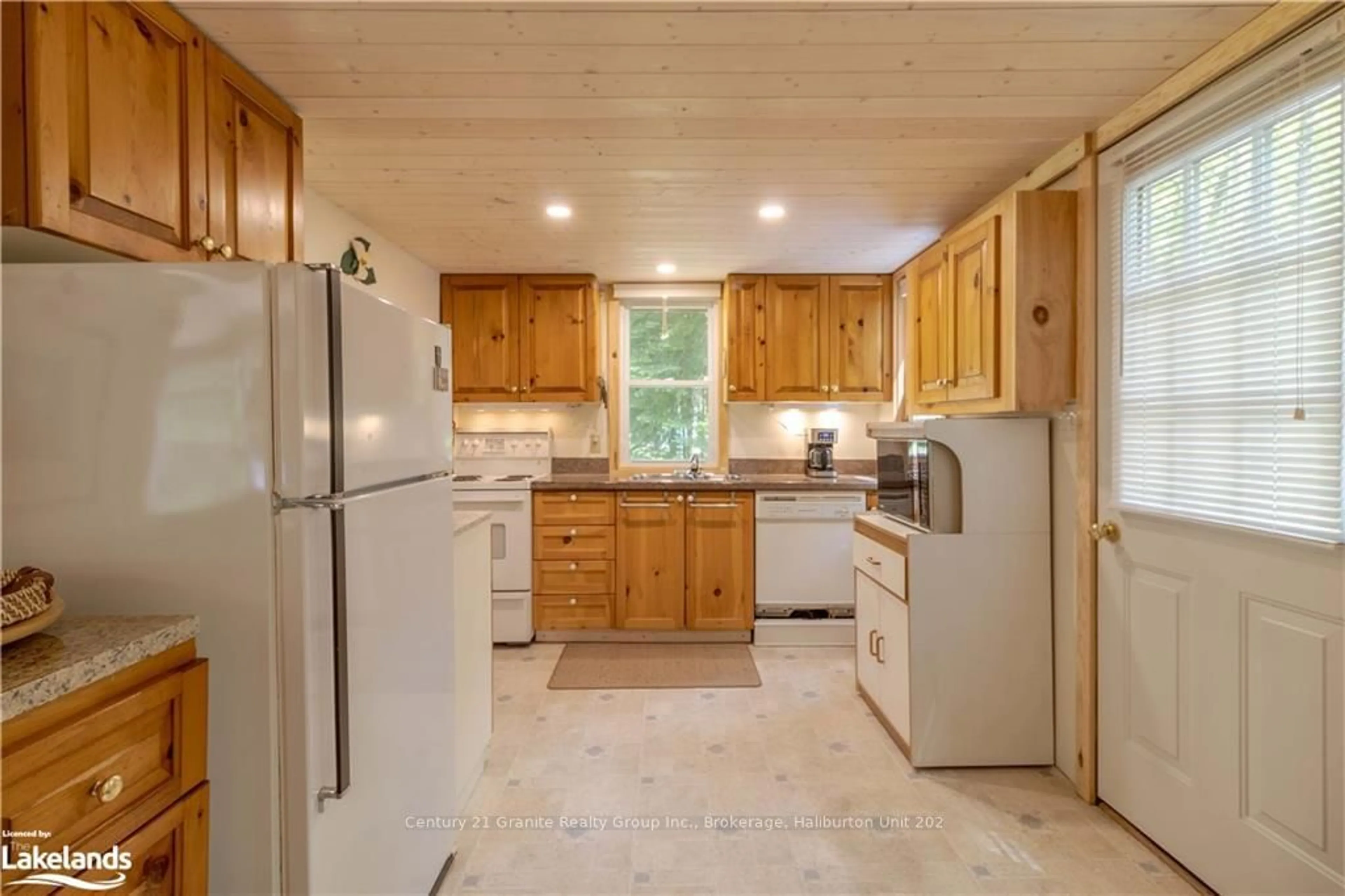 Standard kitchen, wood floors, cottage for 1226 Dignan Rd, Dysart et al Ontario K0M 1S0