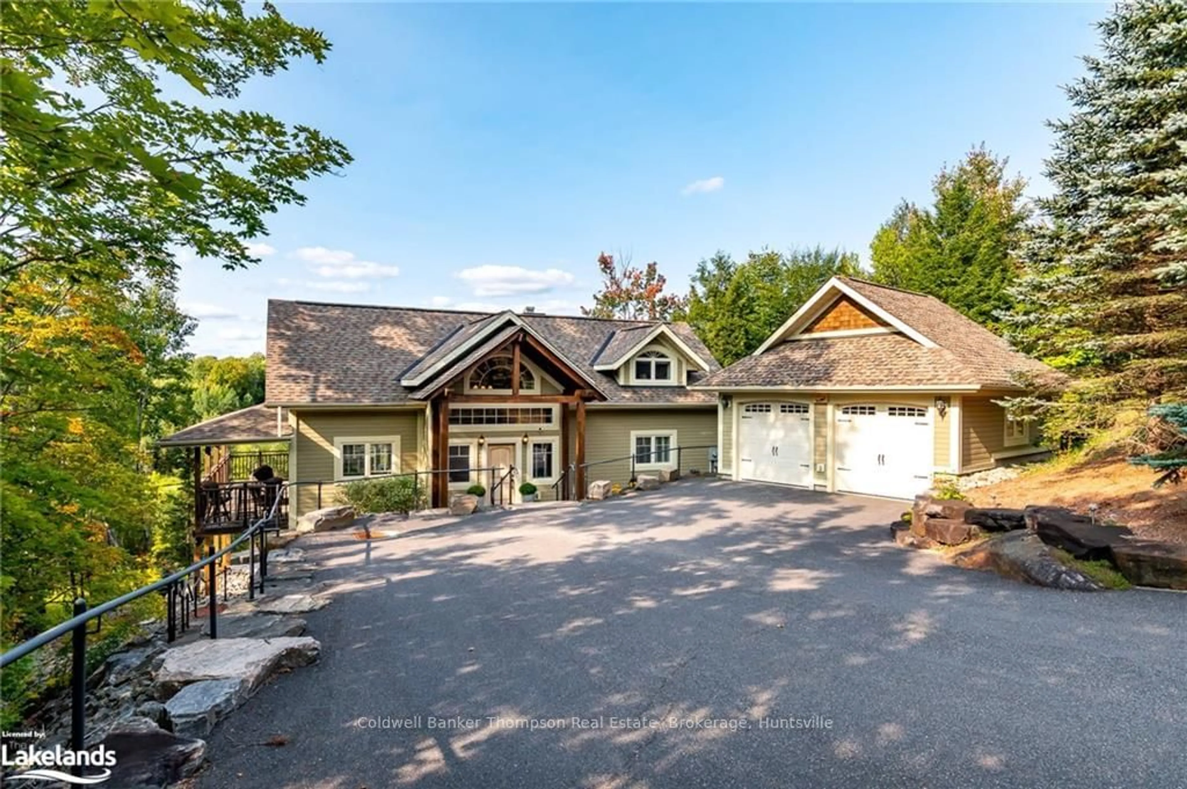 Frontside or backside of a home, cottage for 21 DEERHURST HIGHLANDS Dr, Huntsville Ontario P1H 1B1