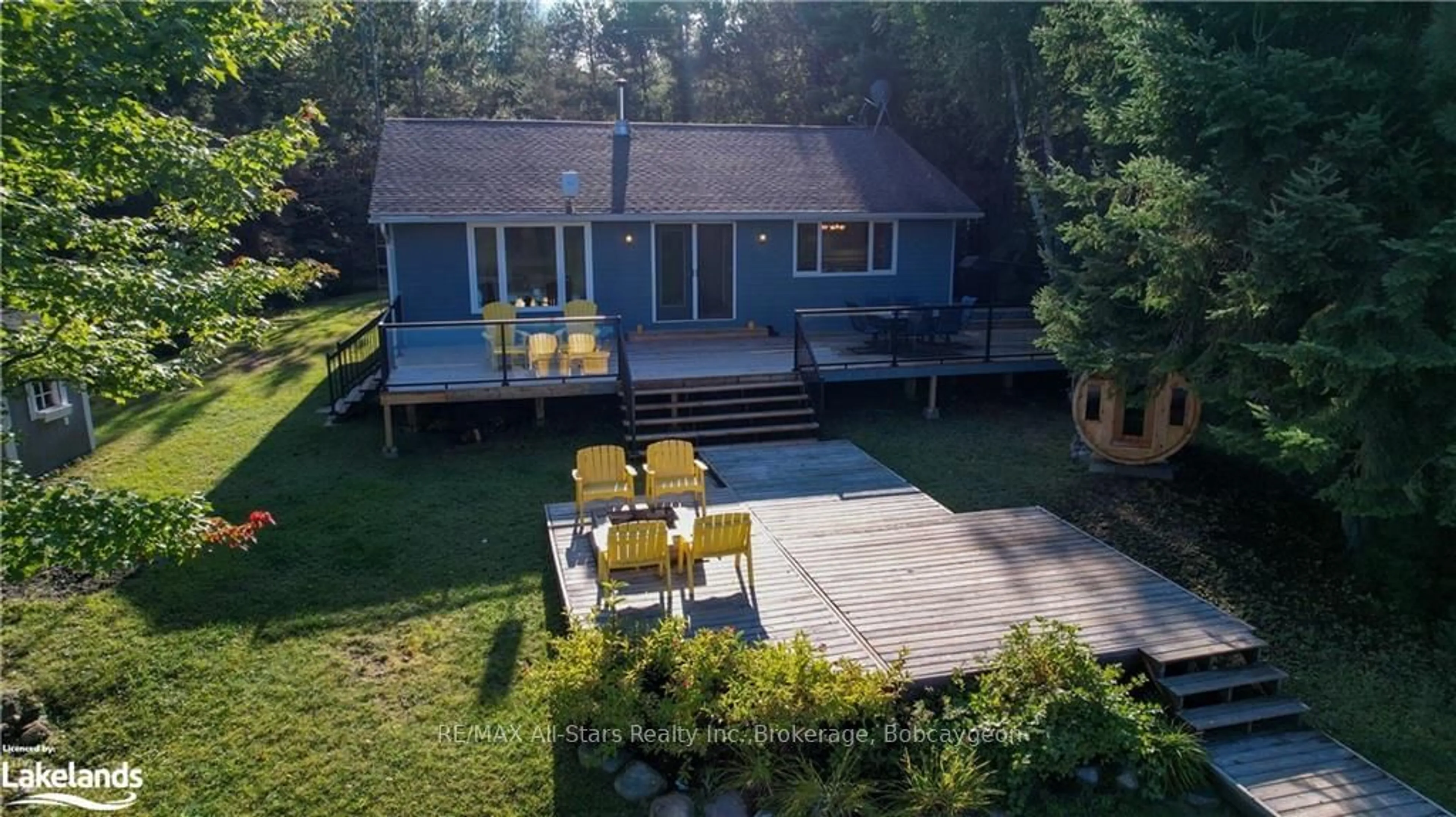 A pic from exterior of the house or condo, the fenced backyard for 1086 CAMERON Lane, Algonquin Highlands Ontario L0M 1J0