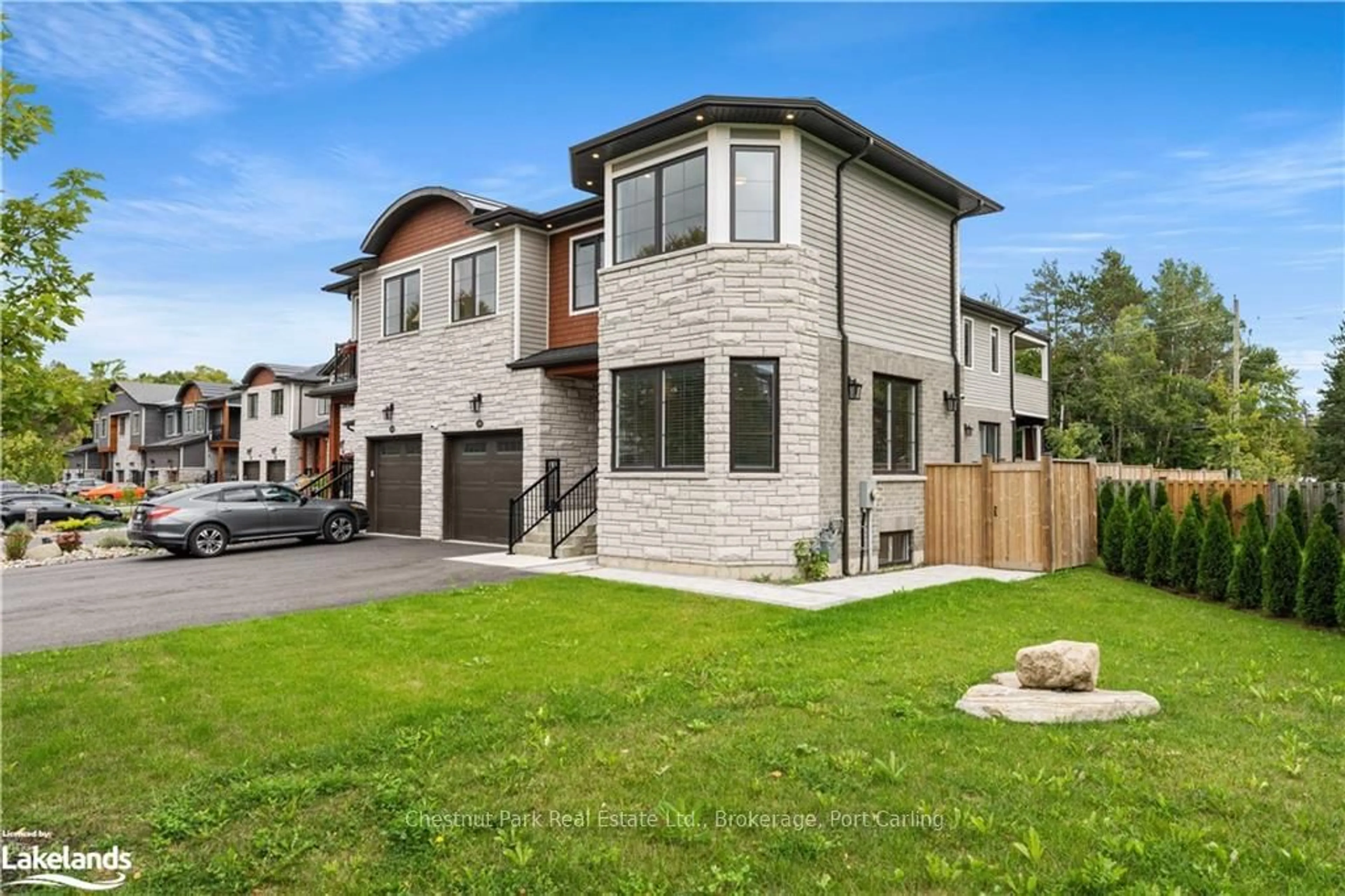 Frontside or backside of a home, the fenced backyard for 181 ANGLO St, Bracebridge Ontario P1L 2H3