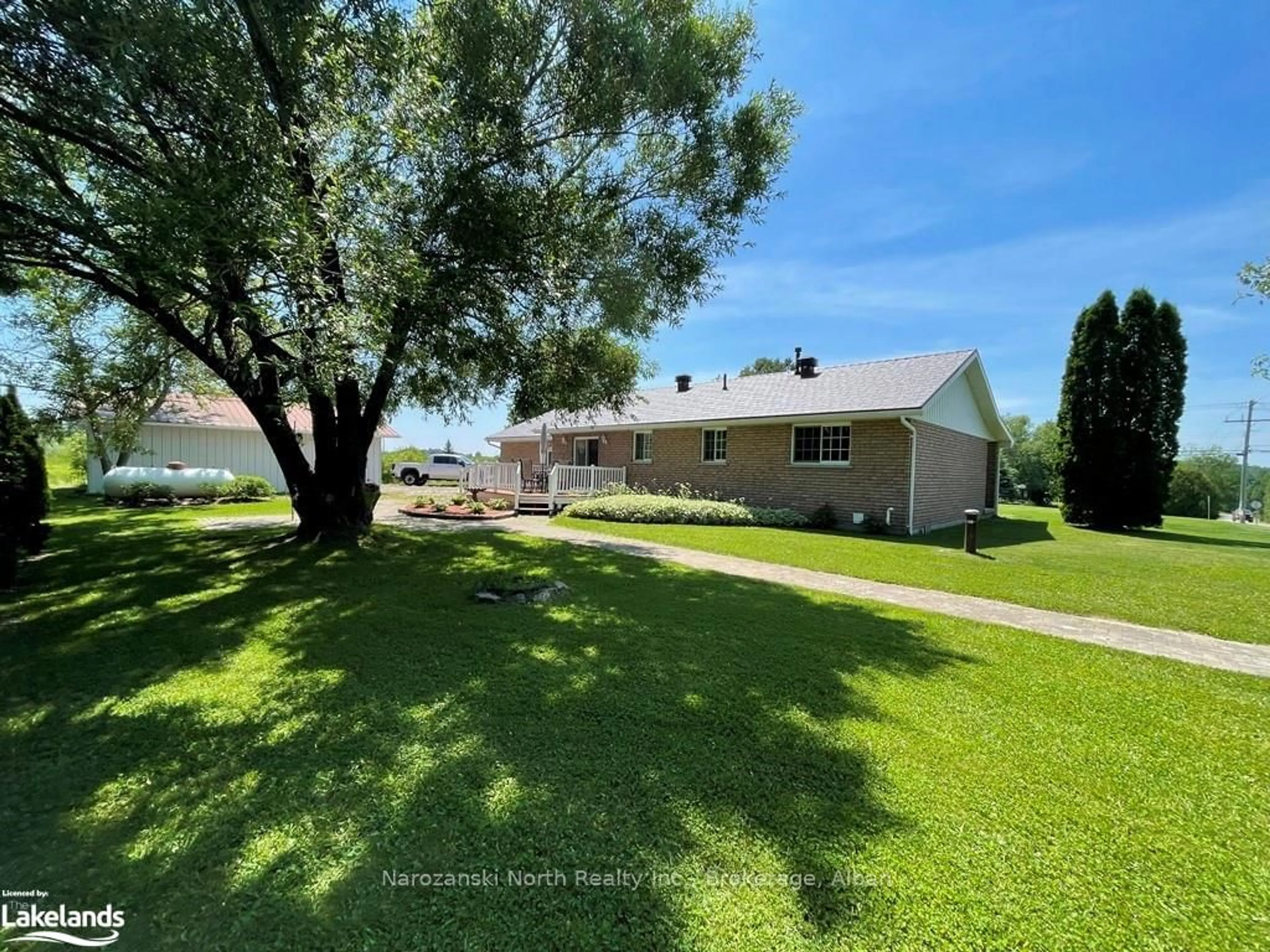 Frontside or backside of a home, the fenced backyard for 24 MONETVILLE Rd, French River Ontario P0M 2K0