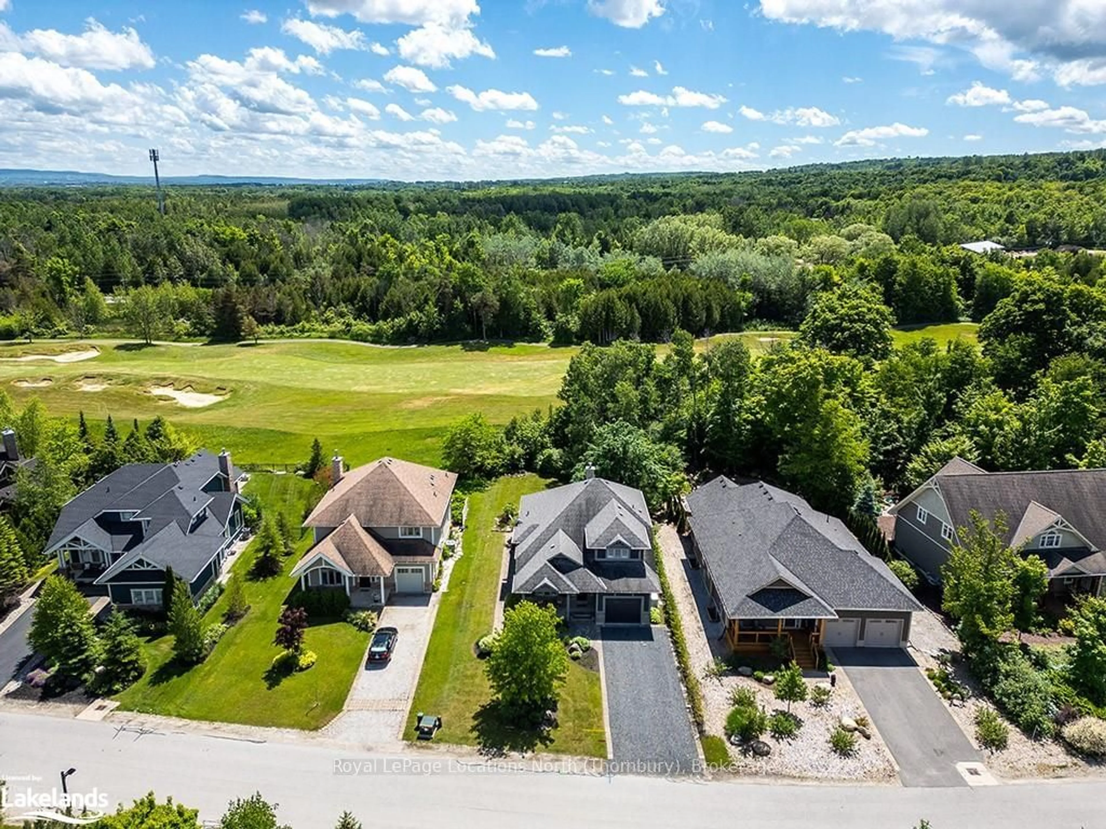 Frontside or backside of a home, the street view for 128 RANKIN'S Cres, Blue Mountains Ontario N0H 2P0