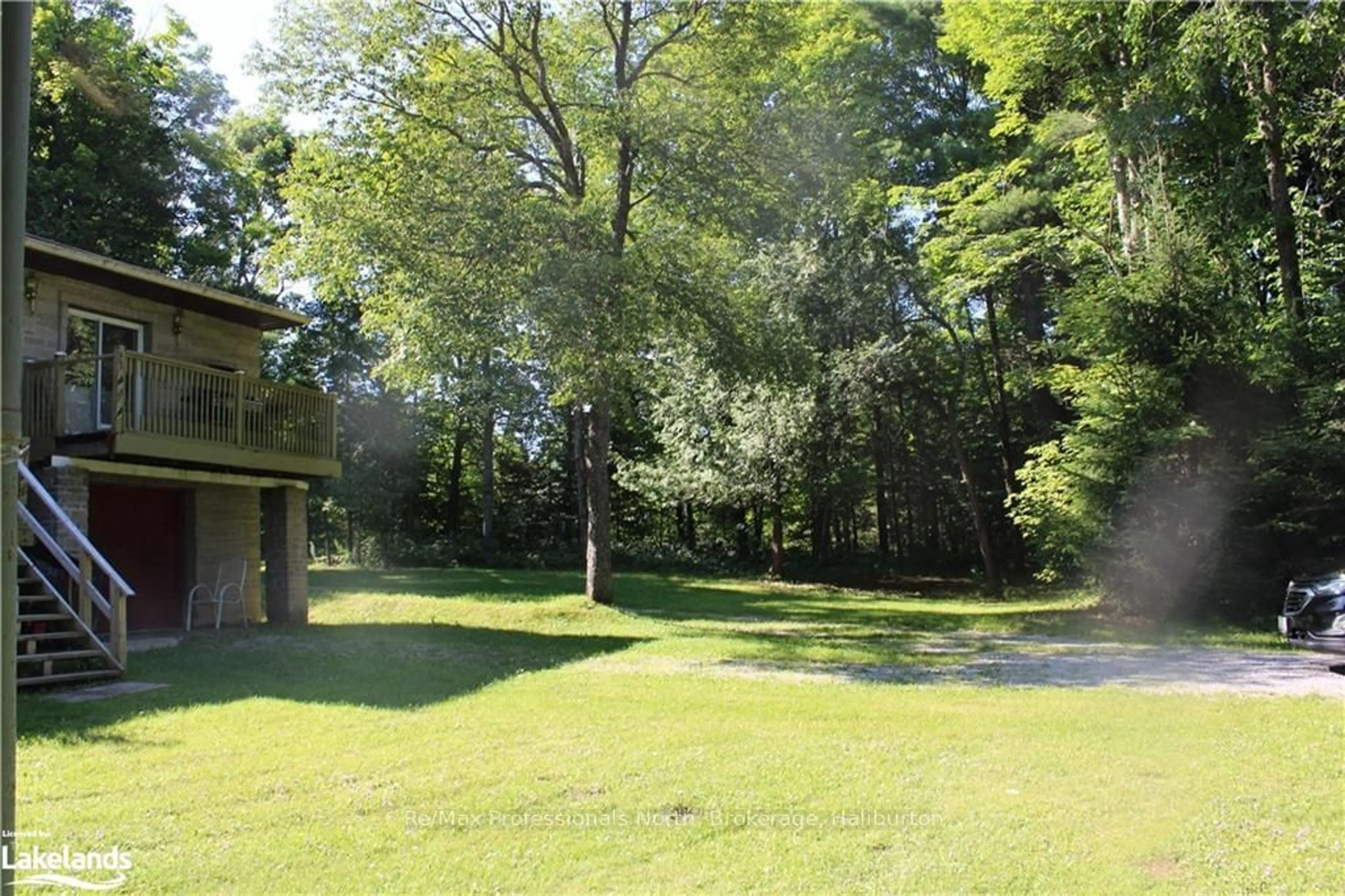 Patio, the fenced backyard for 1200 GLAMOR LAKE Rd, Highlands East Ontario K0M 1R0