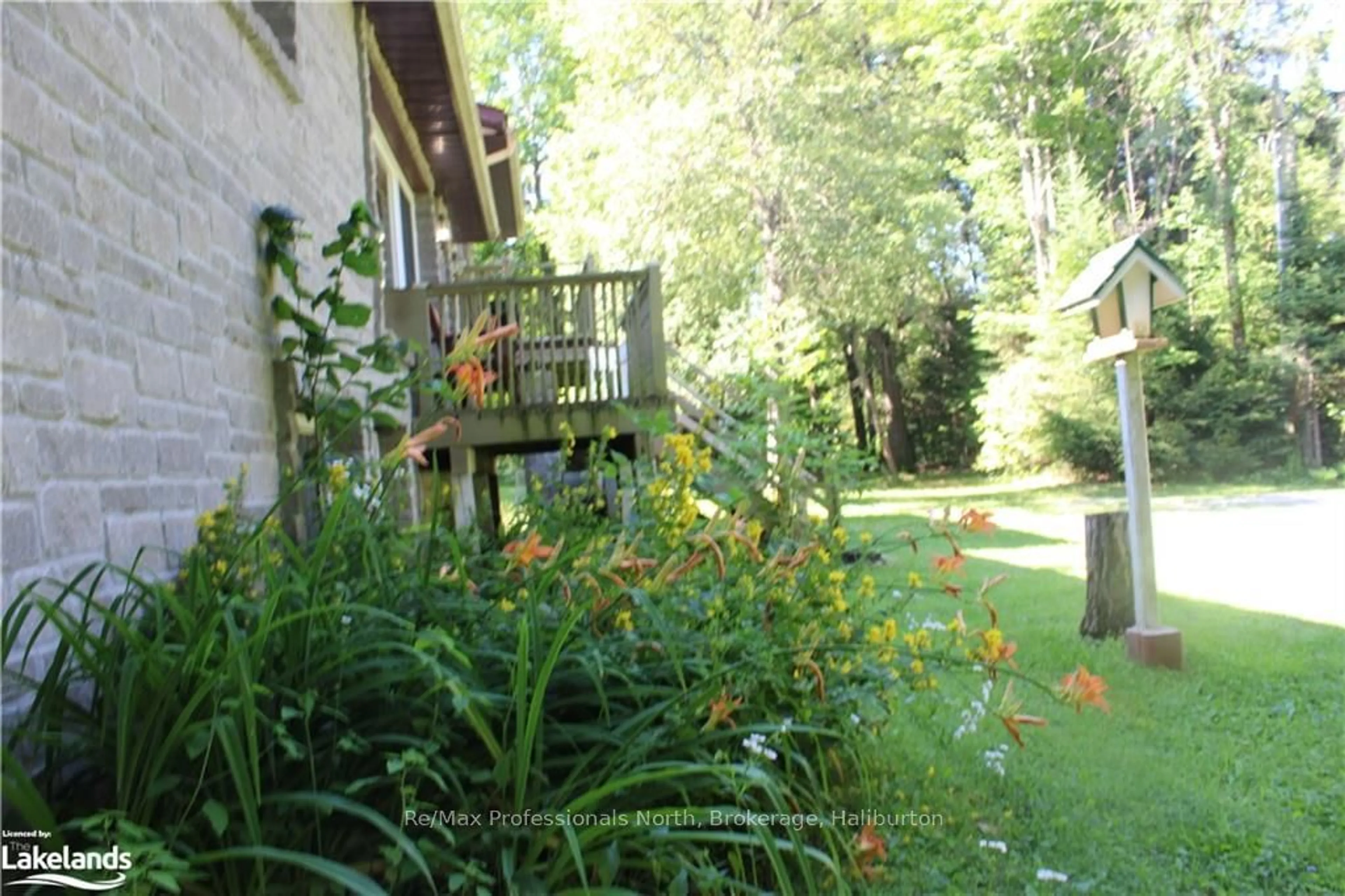 Patio, the fenced backyard for 1200 GLAMOR LAKE Rd, Highlands East Ontario K0M 1R0