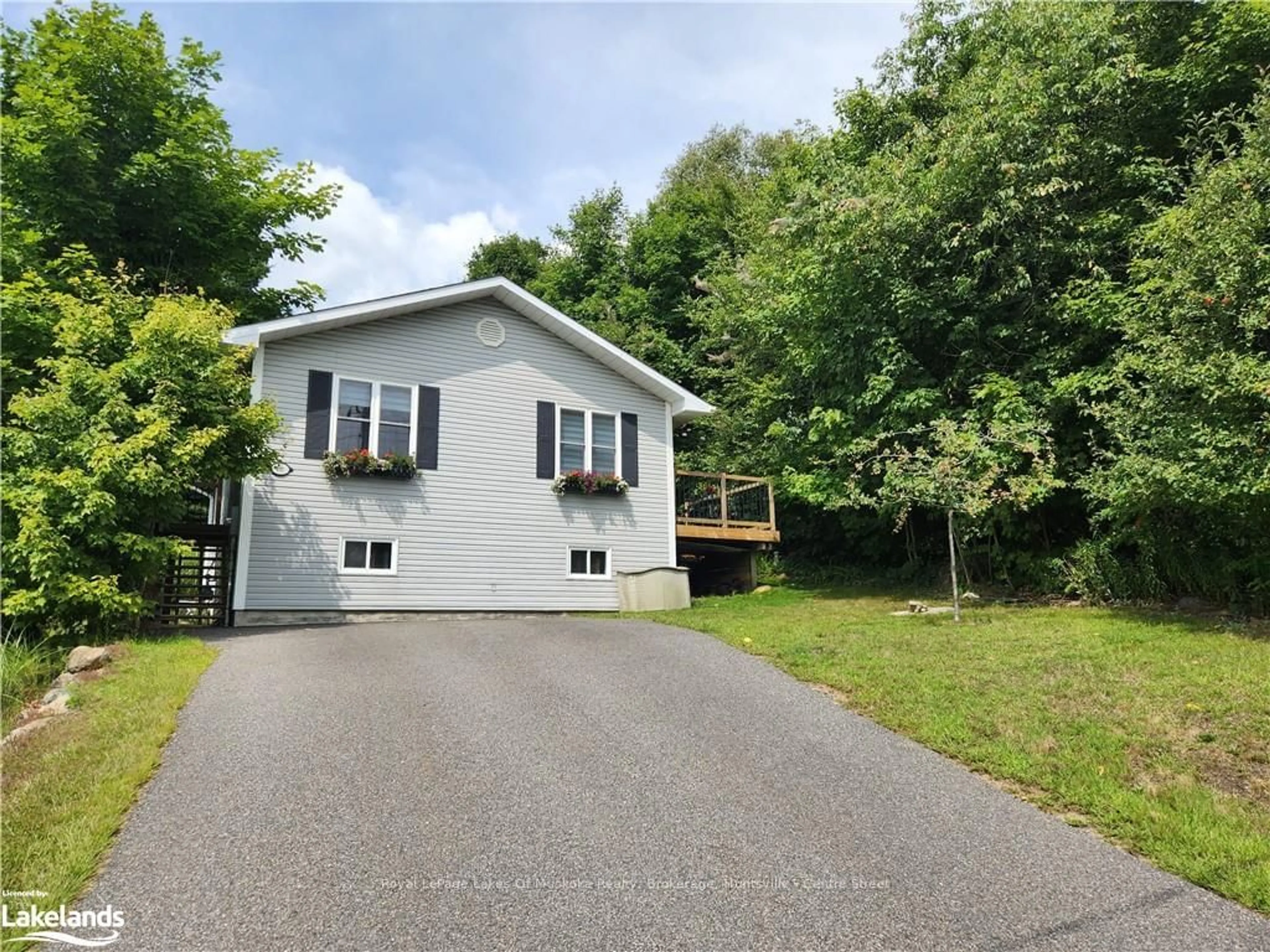 Frontside or backside of a home, cottage for 58 HANES Rd, Huntsville Ontario P1H 2P5